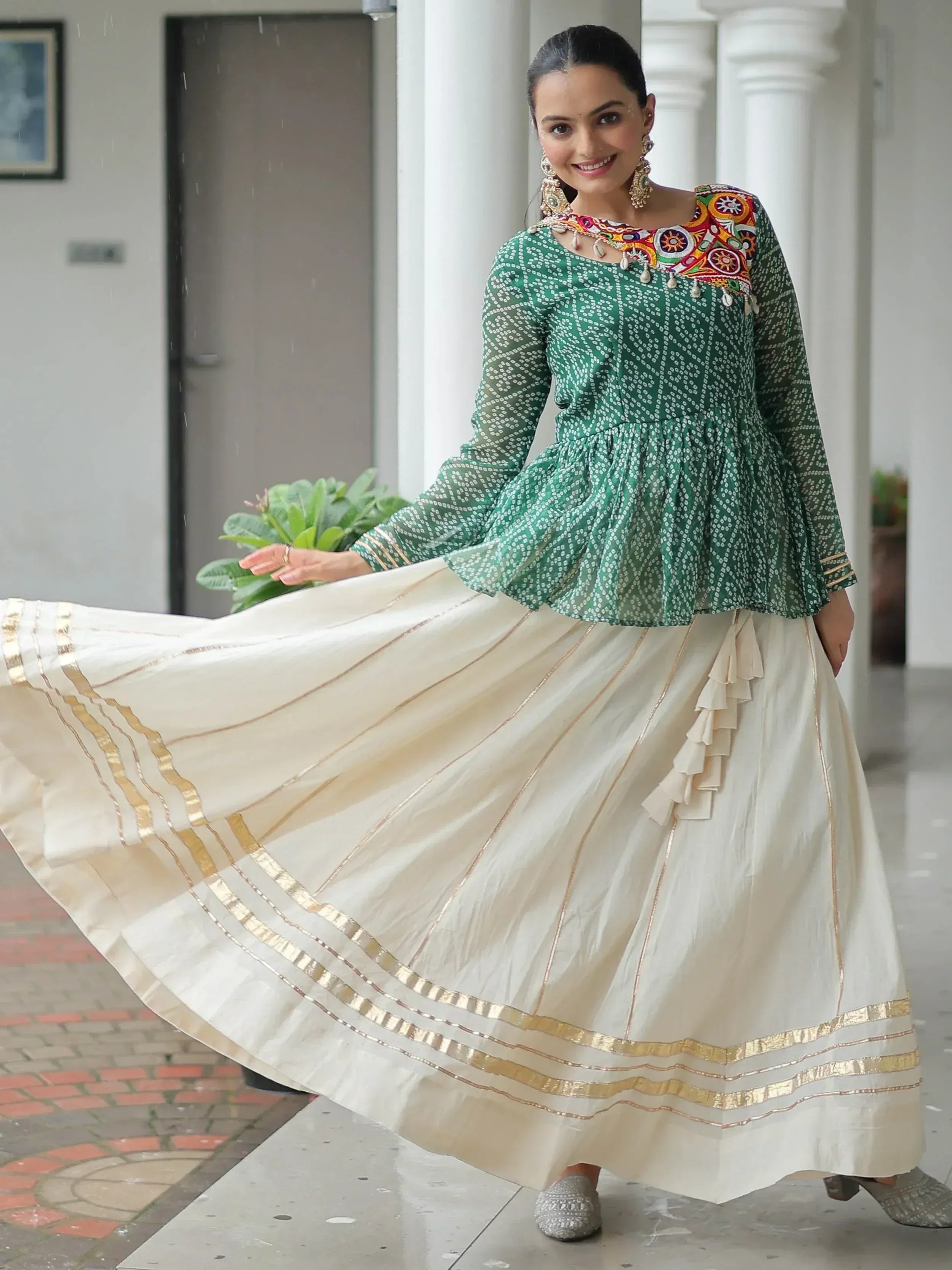 Green embroidered top with cream pleated skirt, Indian ethnic wear for women