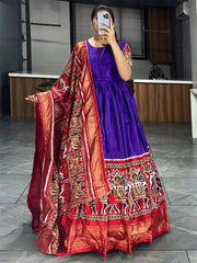 Woman wearing purple ethnic gown with red printed dupatta, Indian designer lehenga style, Ethnic Plus