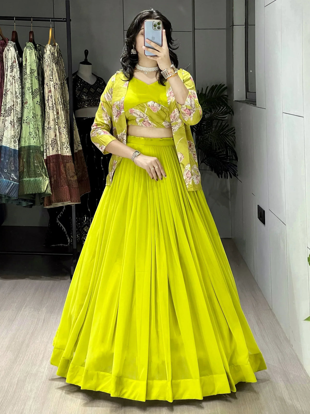 Vibrant yellow lehenga choli with floral jacket, perfect for Indian ethnic wear and festive occasions.