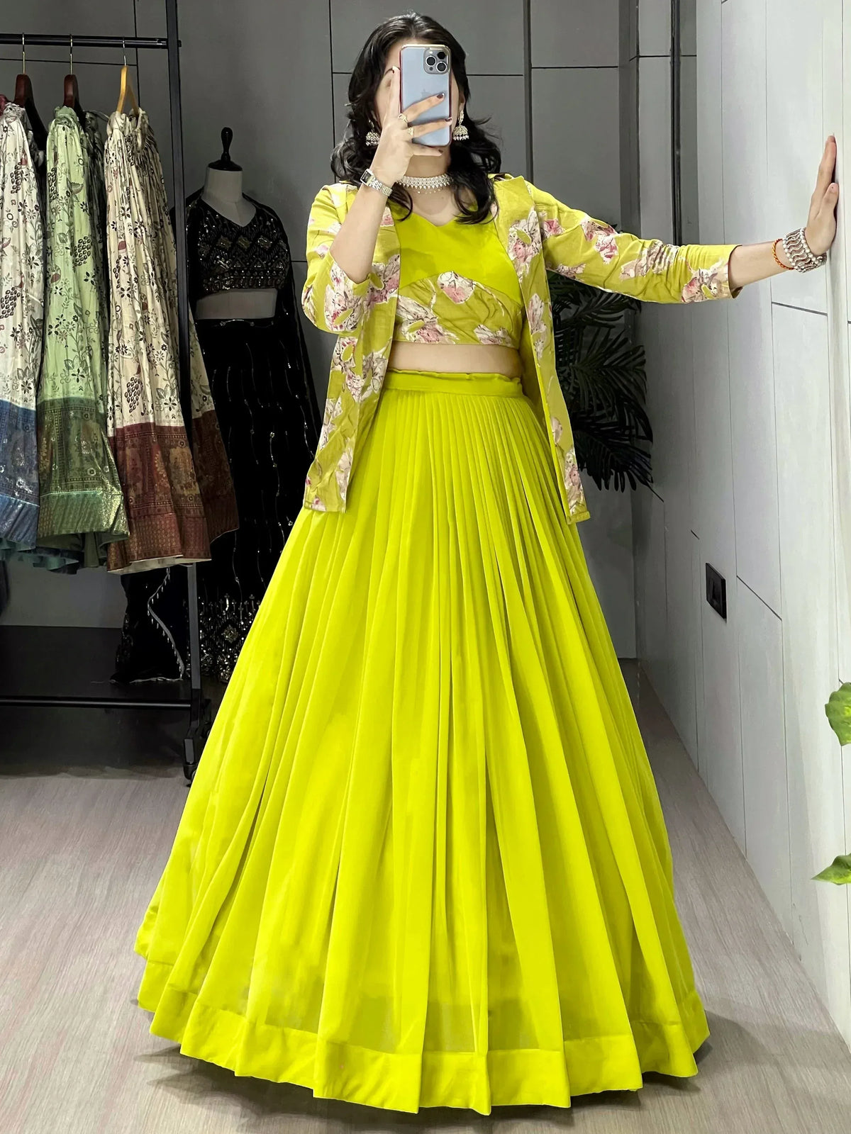 Vibrant yellow lehenga choli with floral jacket, perfect for Indian ethnic wear occasions.