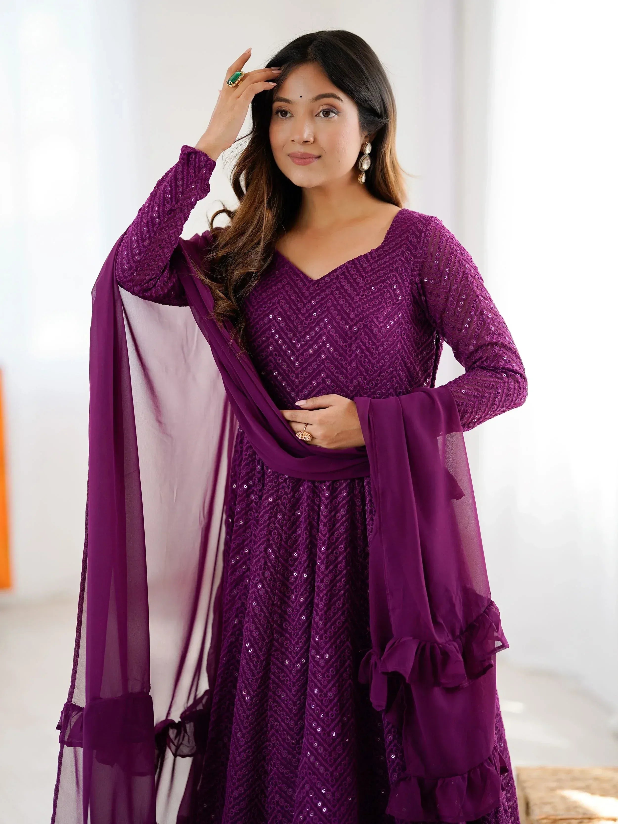 Purple sequin ethnic gown with ruffled sleeves and dupatta, perfect for Indian occasions
