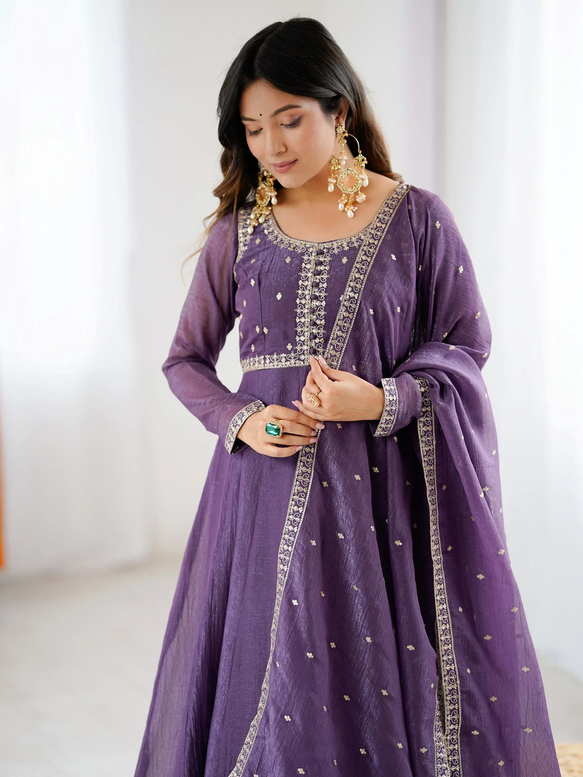 Purple embroidered anarkali suit with gold detailing, perfect for Indian ethnic wear occasions
