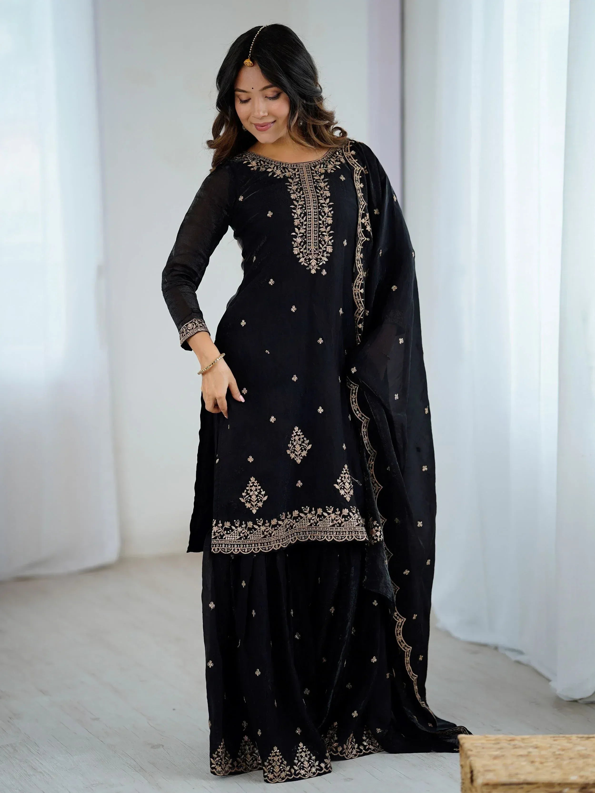 Black embroidered salwar kameez with gold detailing, ethnic Indian wear for women