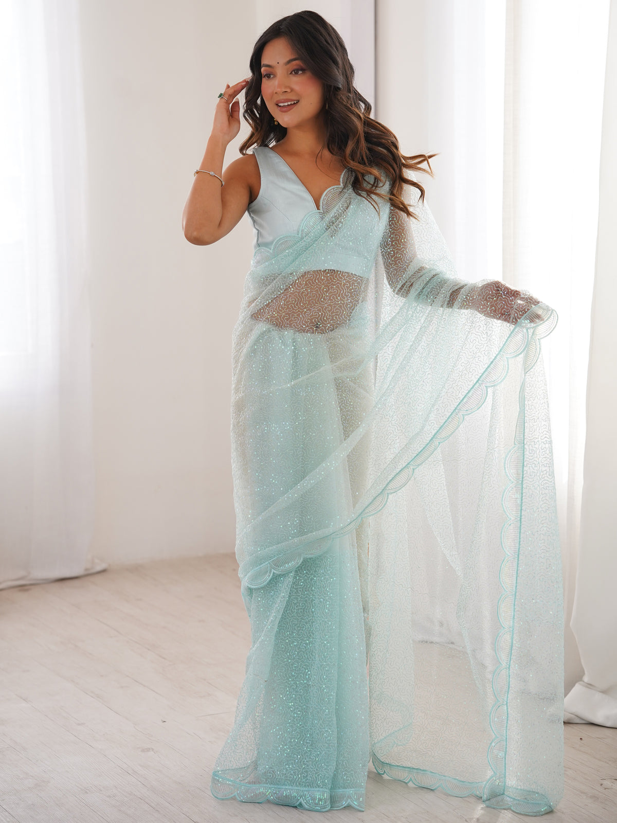 Glowing Sky Blue Sequins Net Event Wear Saree With Blouse