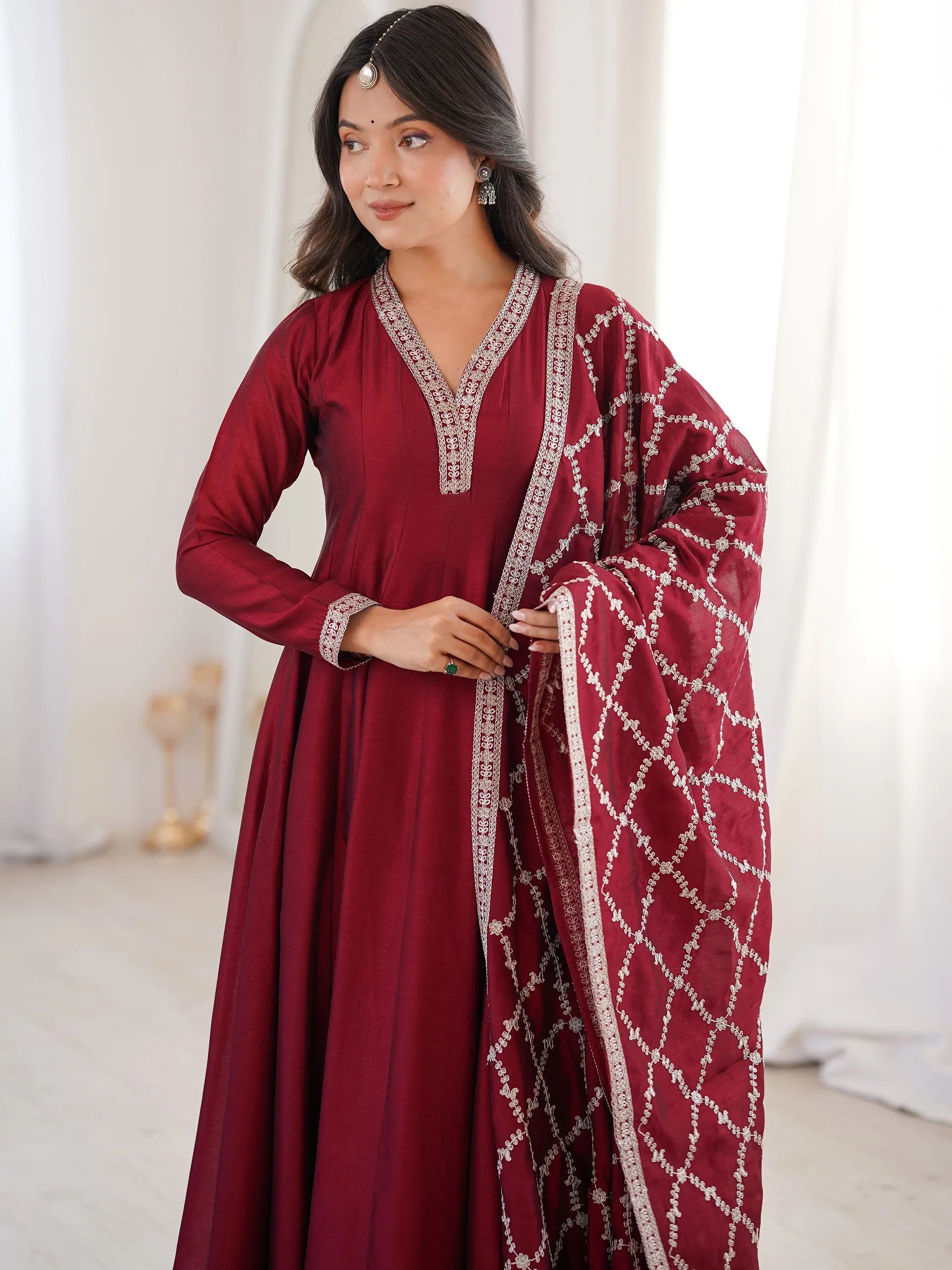 Glamorous Maroon Embroidered Silk Festival Wear Gown With Dupatta