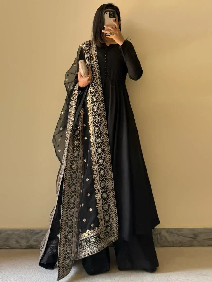 Black ethnic gown with gold embroidery and matching dupatta, stylish Indian wear for women