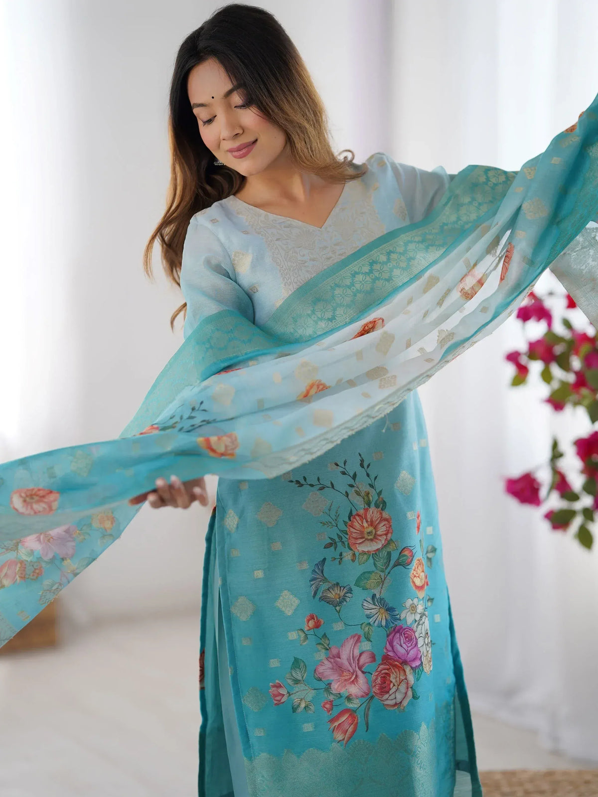 Woman in blue floral printed ethnic kurta with matching dupatta, Indian designer wear