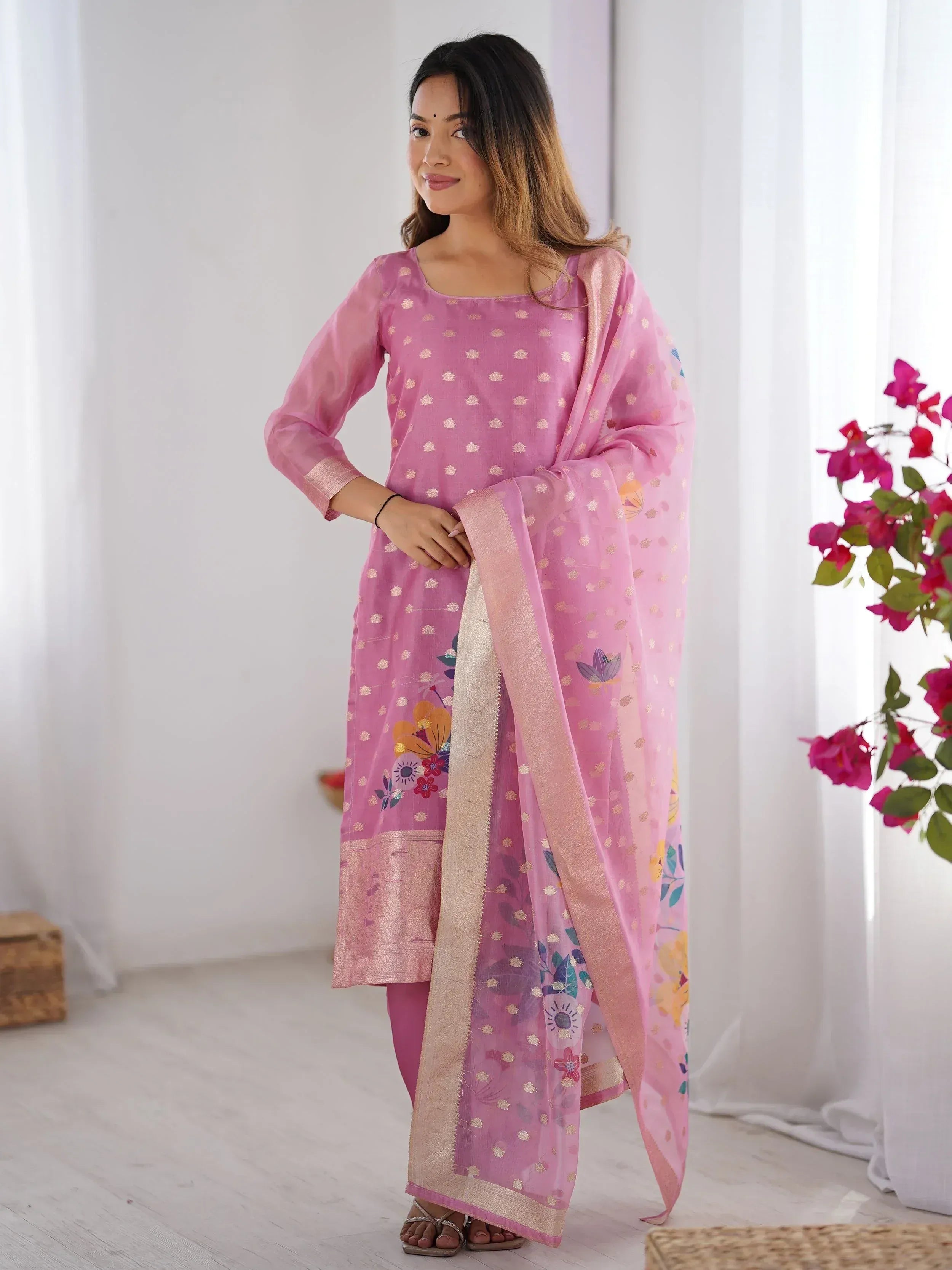 Pink floral printed salwar kameez with gold motifs and dupatta, ethnic Indian wear for women