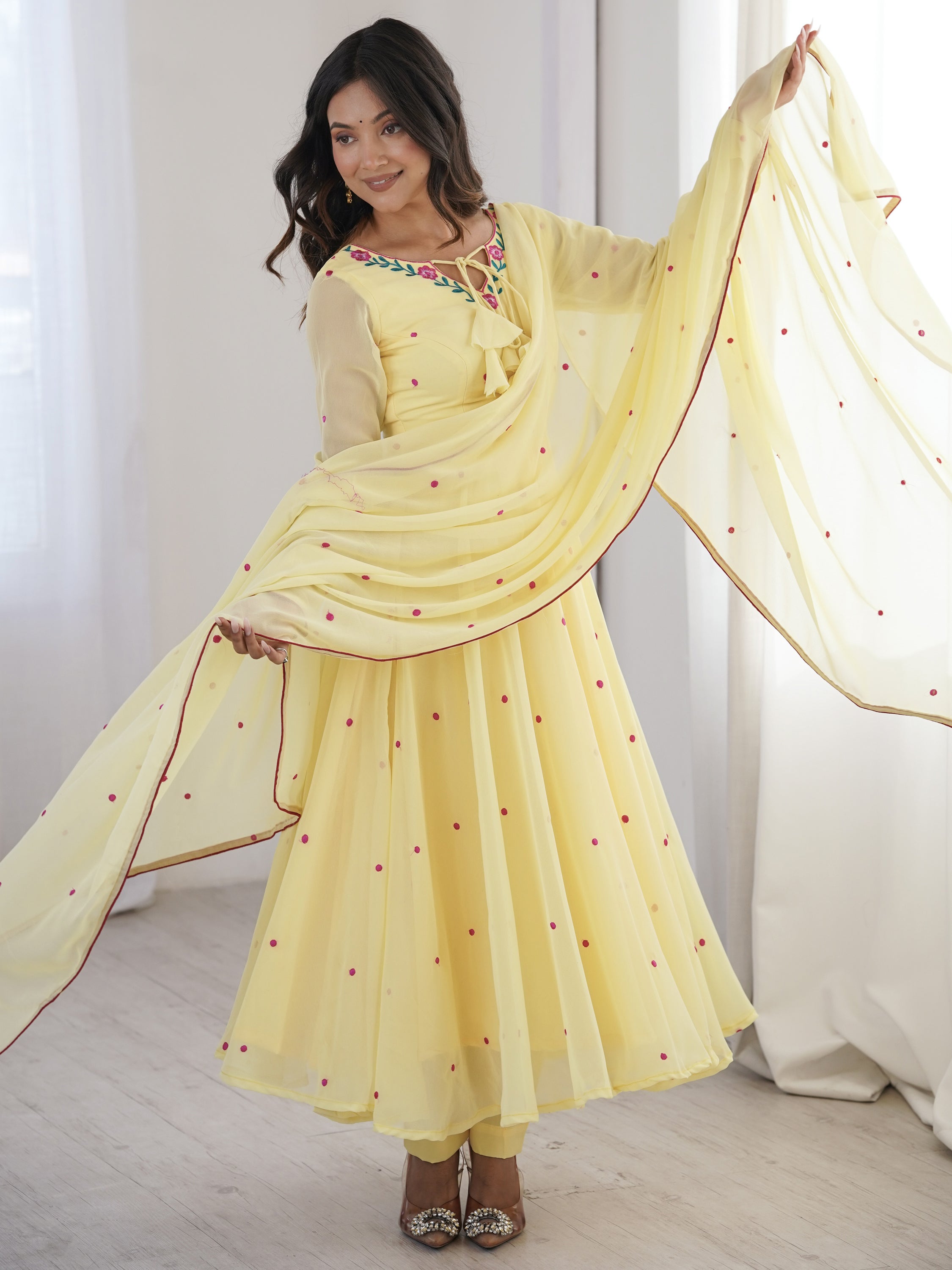 Dazzling Yellow Thread Work Georgette Haldi Wear Anarkali Suit