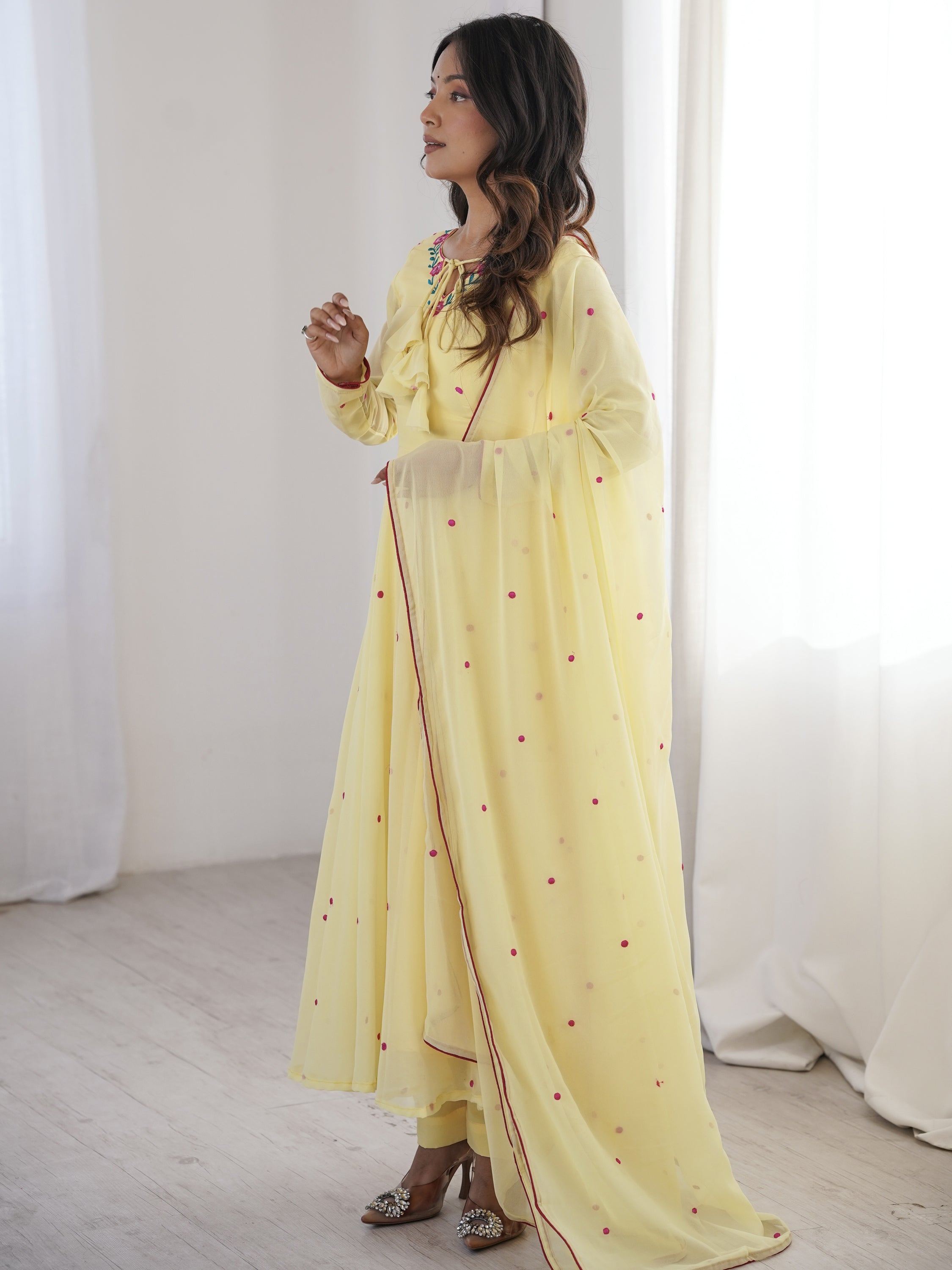 Dazzling Yellow Thread Work Georgette Haldi Wear Anarkali Suit