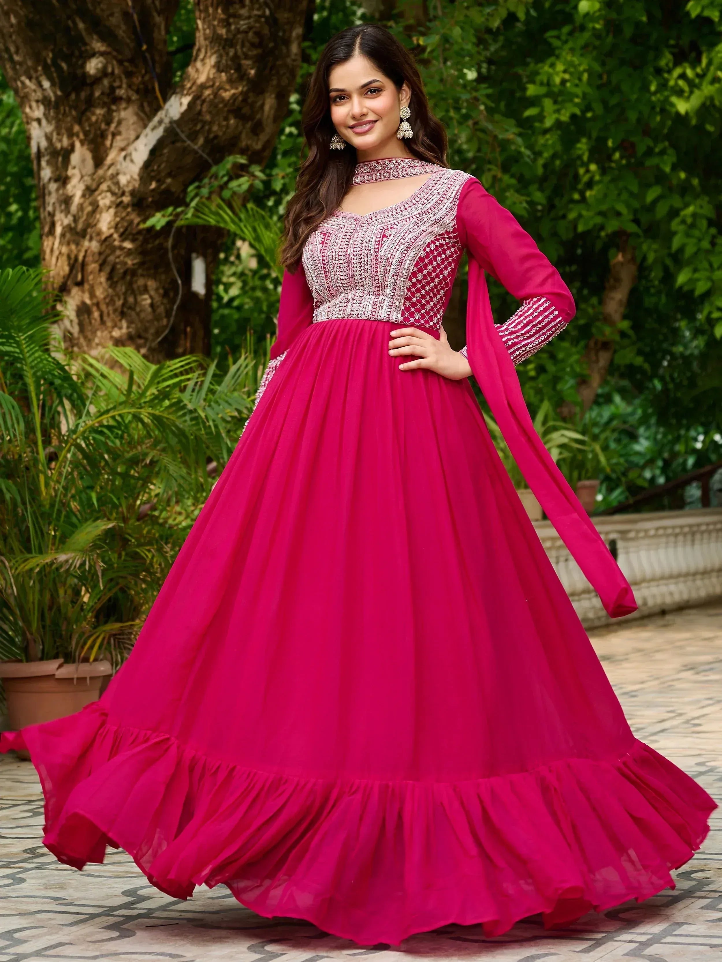 Pink embroidered anarkali gown with flared skirt, perfect for Indian ethnic wear occasions