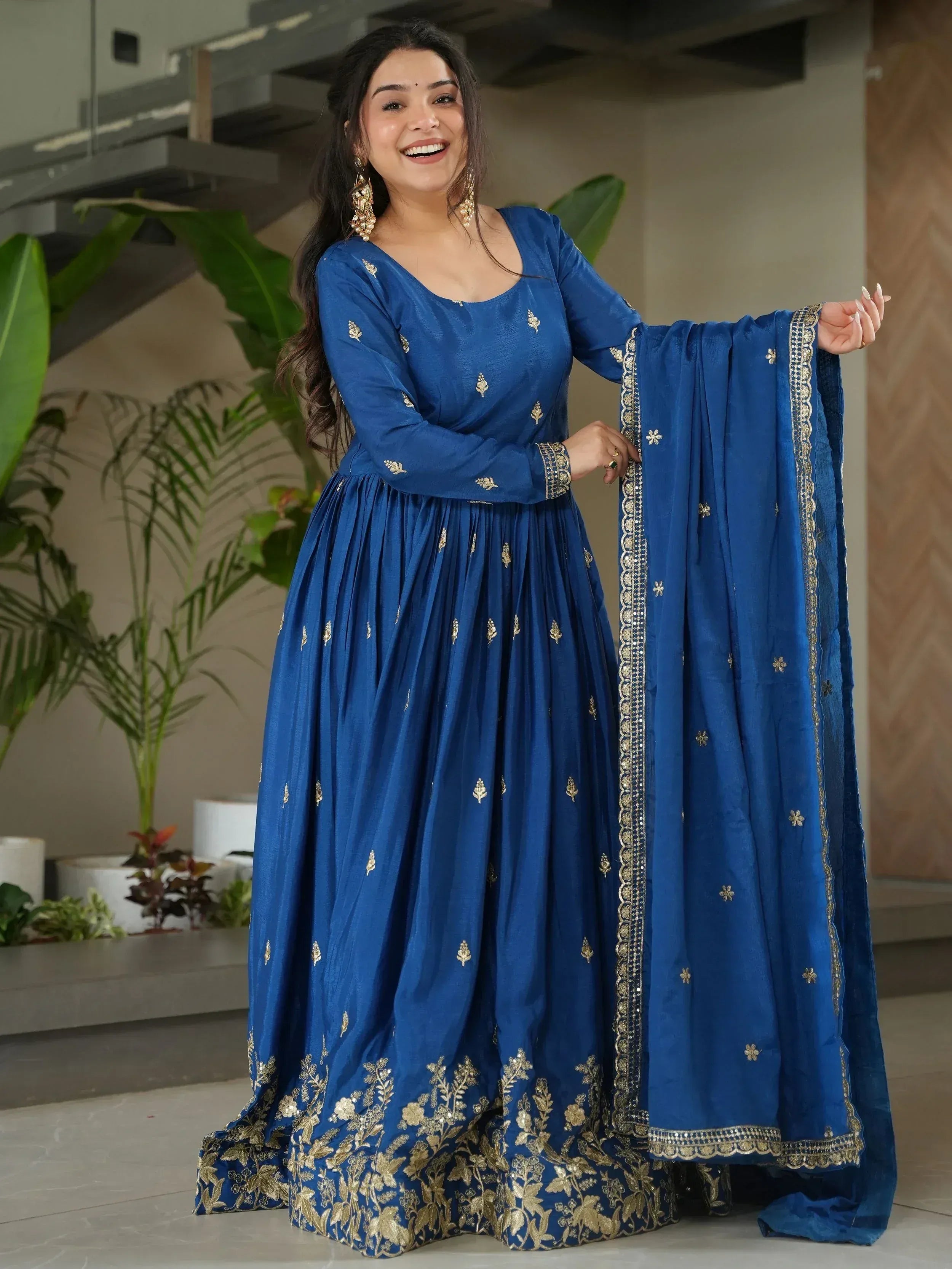 Blue embroidered anarkali suit with gold detailing, perfect for Indian ethnic wear occasions