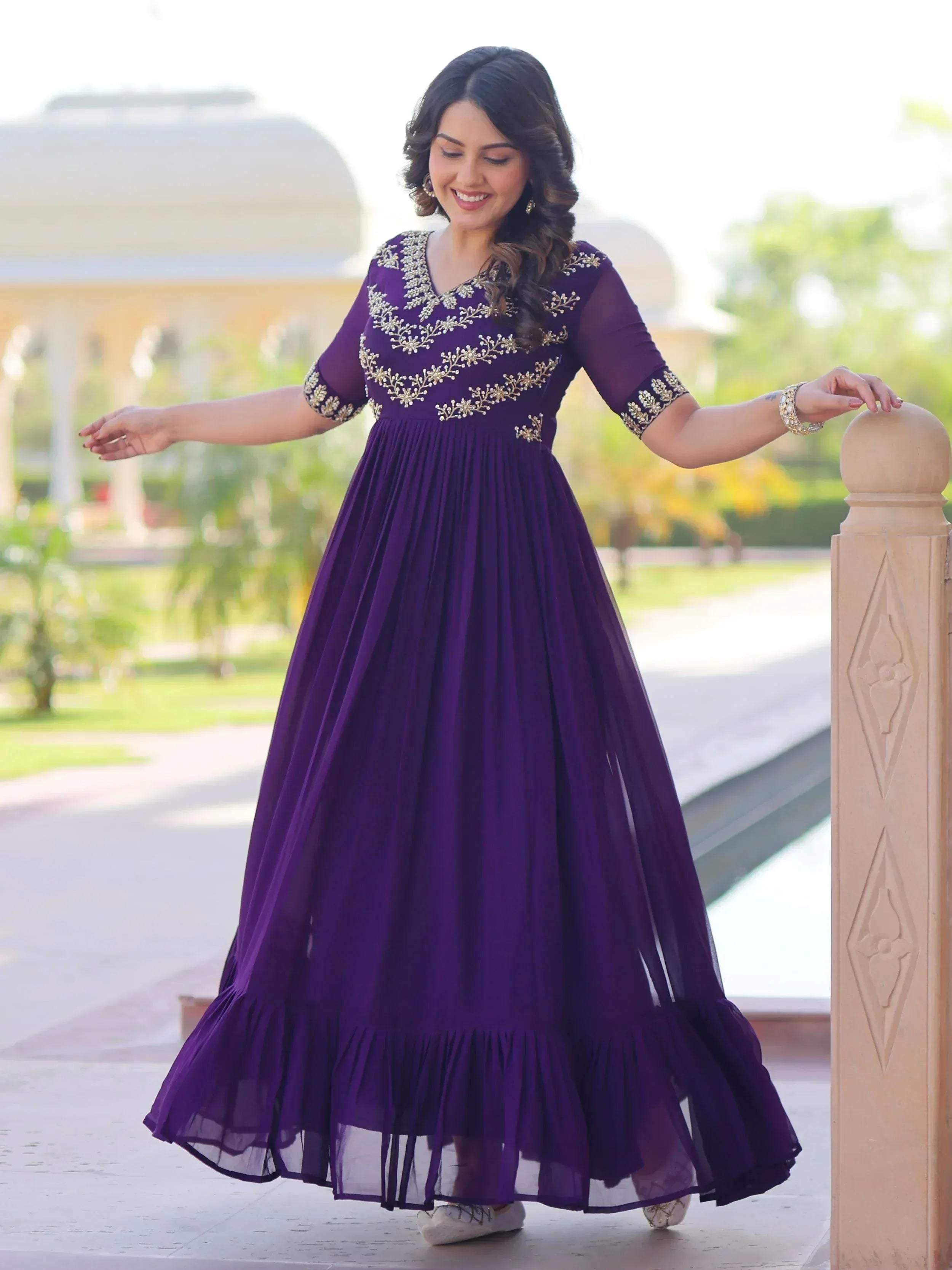 Purple ethnic gown with gold embroidery, perfect for Indian occasions and festive wear