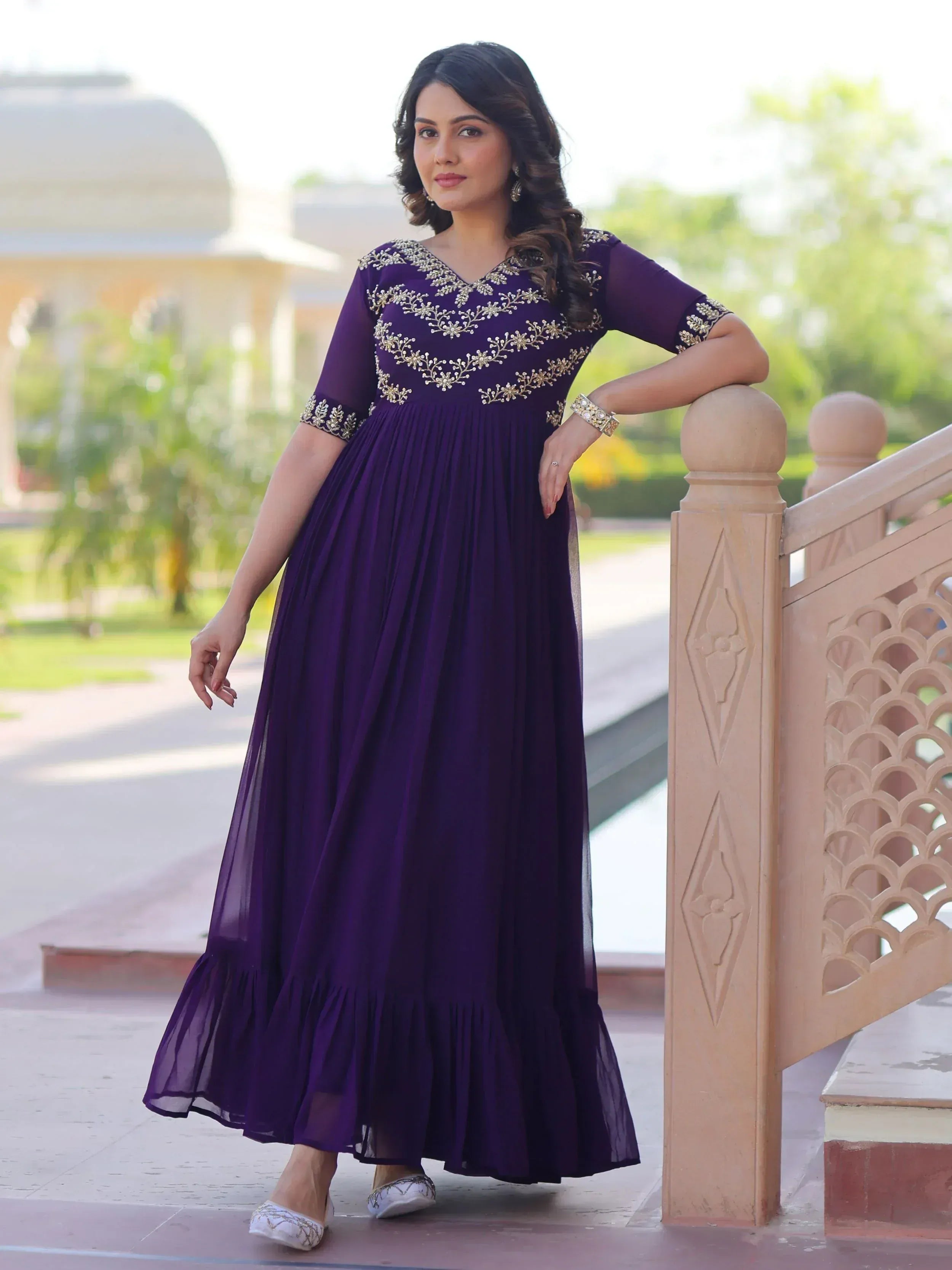 Purple ethnic gown with gold embroidery, perfect for Indian occasions and festive events
