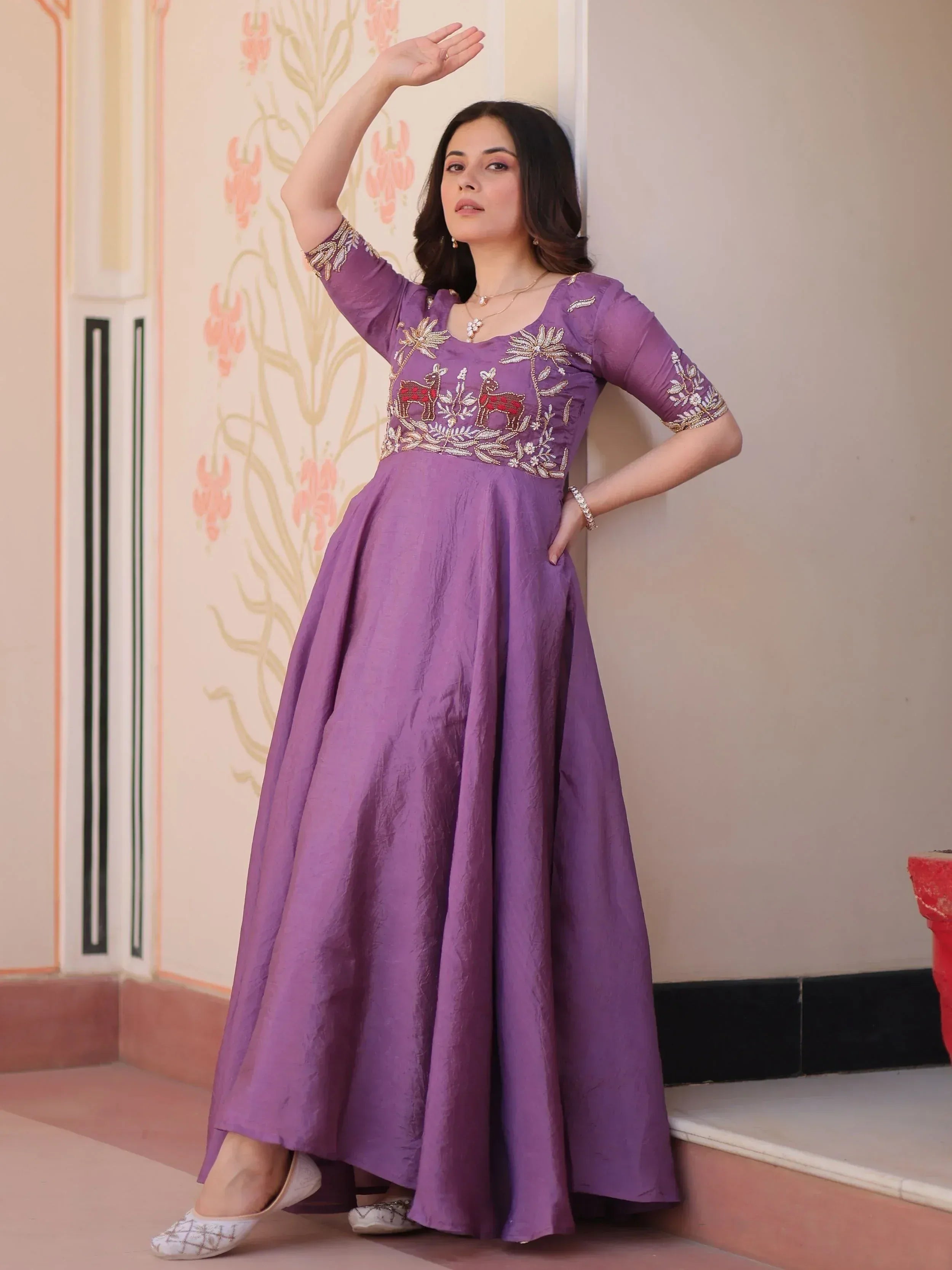 Purple ethnic gown with deer embroidery, perfect for Indian occasions and festive wear.