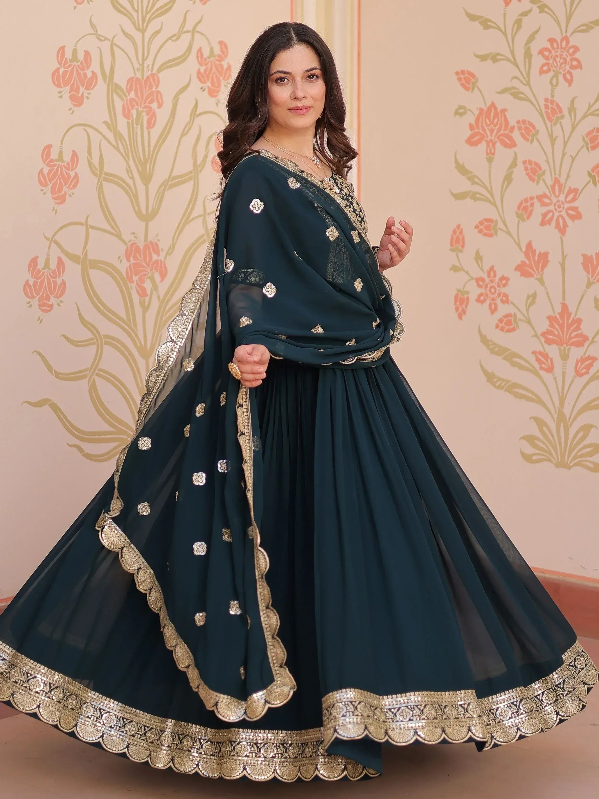 Elegant dark green lehenga choli with gold embroidery and scalloped border, perfect for Indian ethnic wear