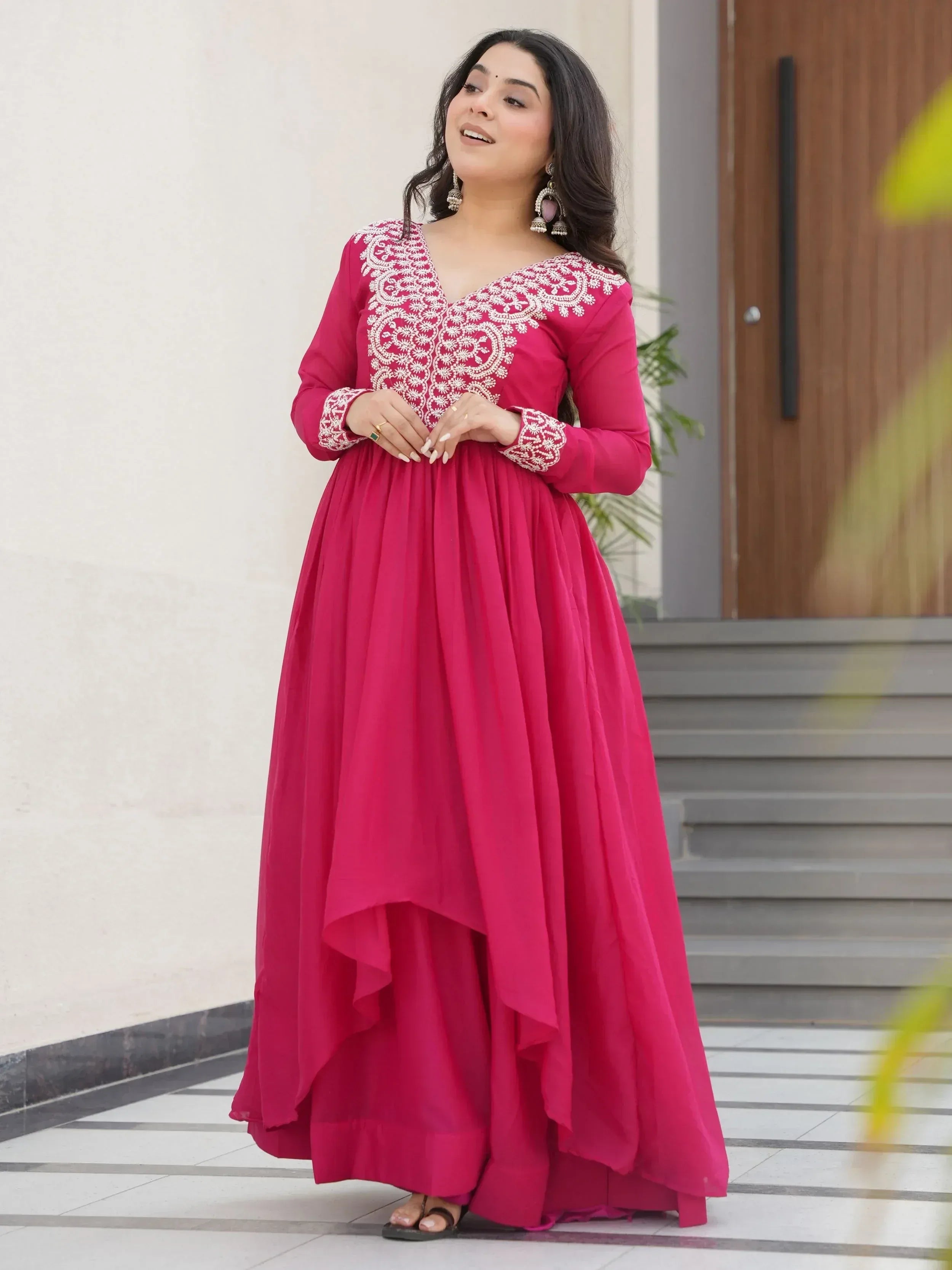 Pink ethnic gown with white embroidery, long sleeves, and high-low hem for women
