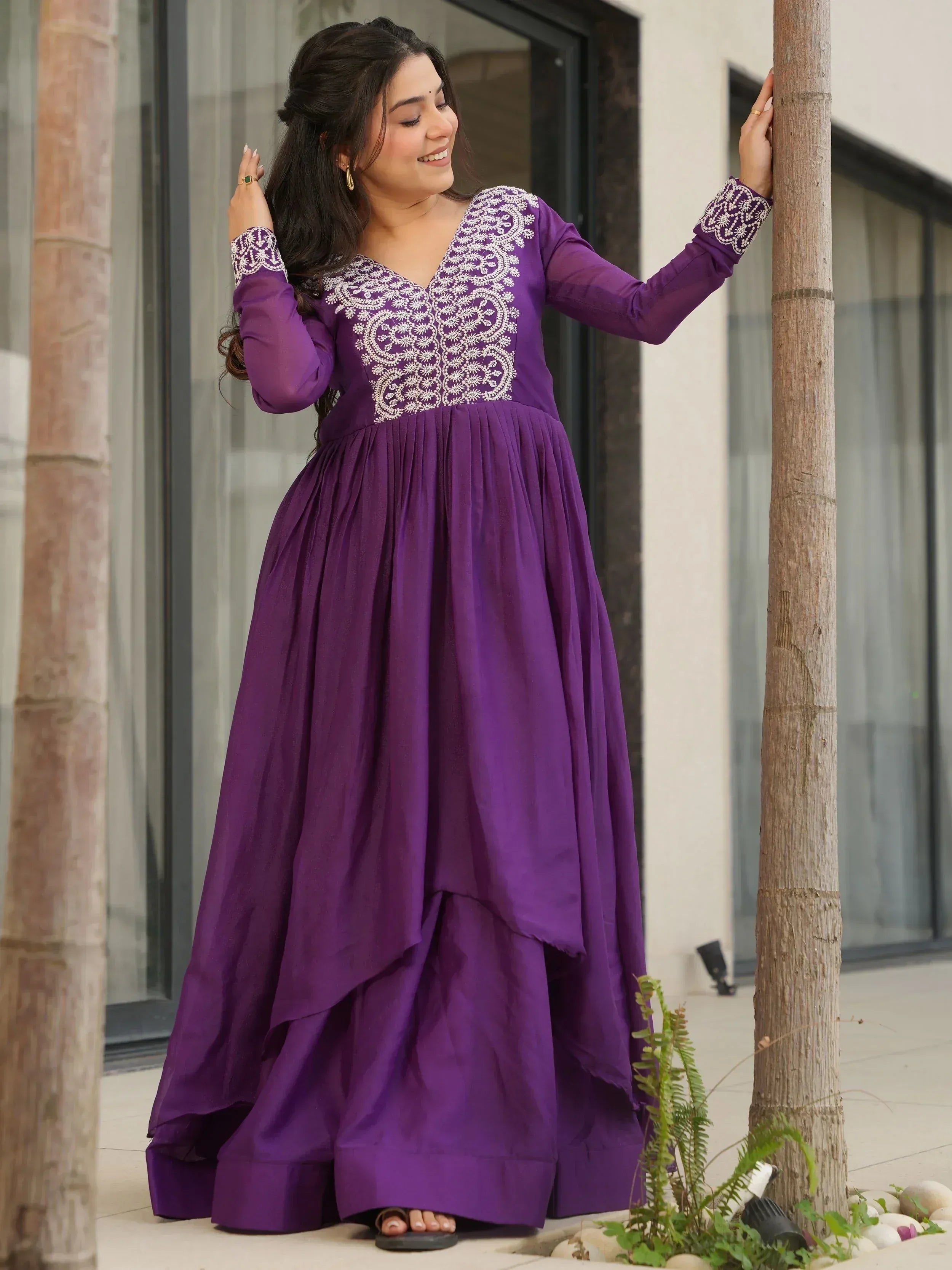 Purple ethnic gown with white embroidery, long sleeves, and flared skirt for women