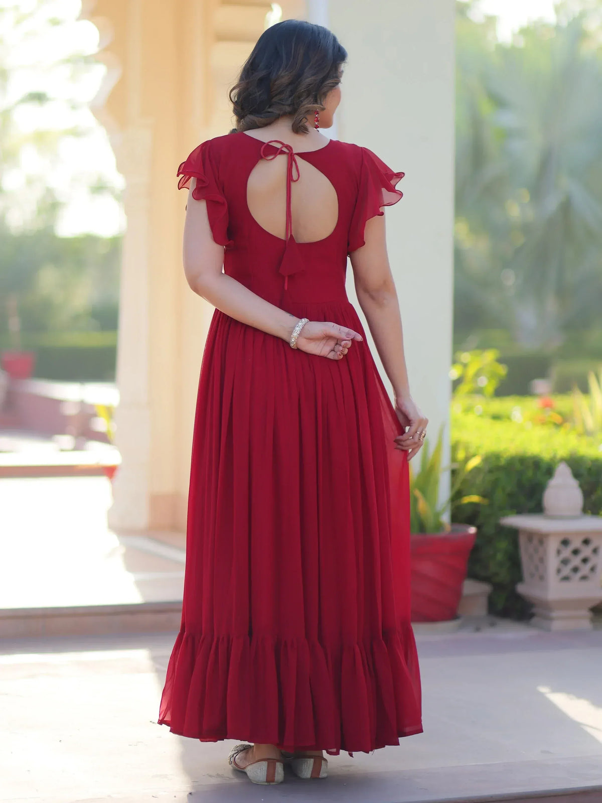 Red ethnic gown with back tie and ruffle sleeves, perfect for Indian occasions