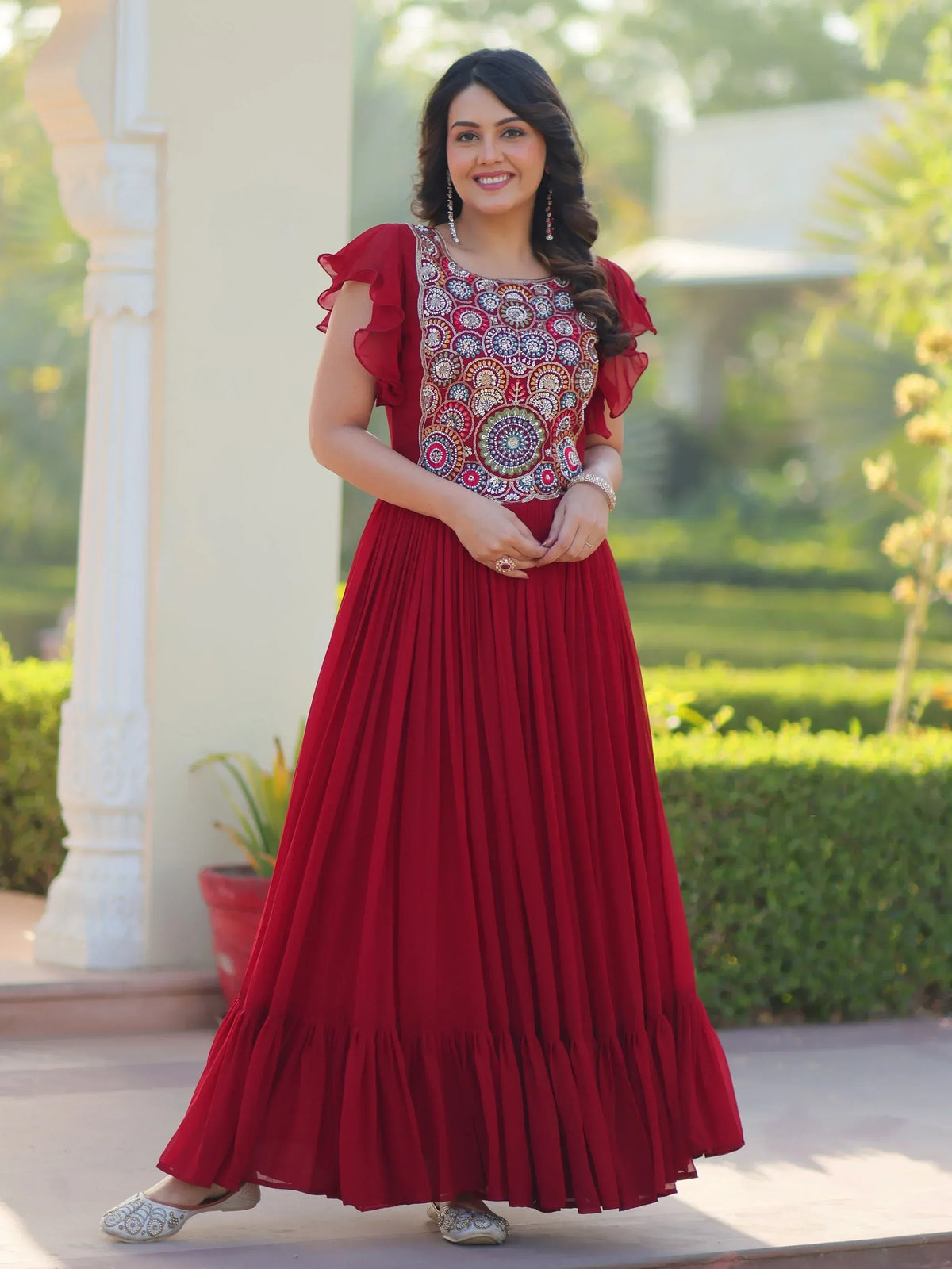 Red ethnic gown with floral embroidery and ruffled sleeves for women