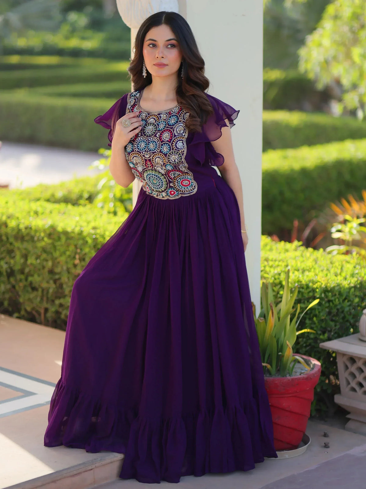 Purple ethnic gown with colorful embroidery, perfect for Indian festive occasions
