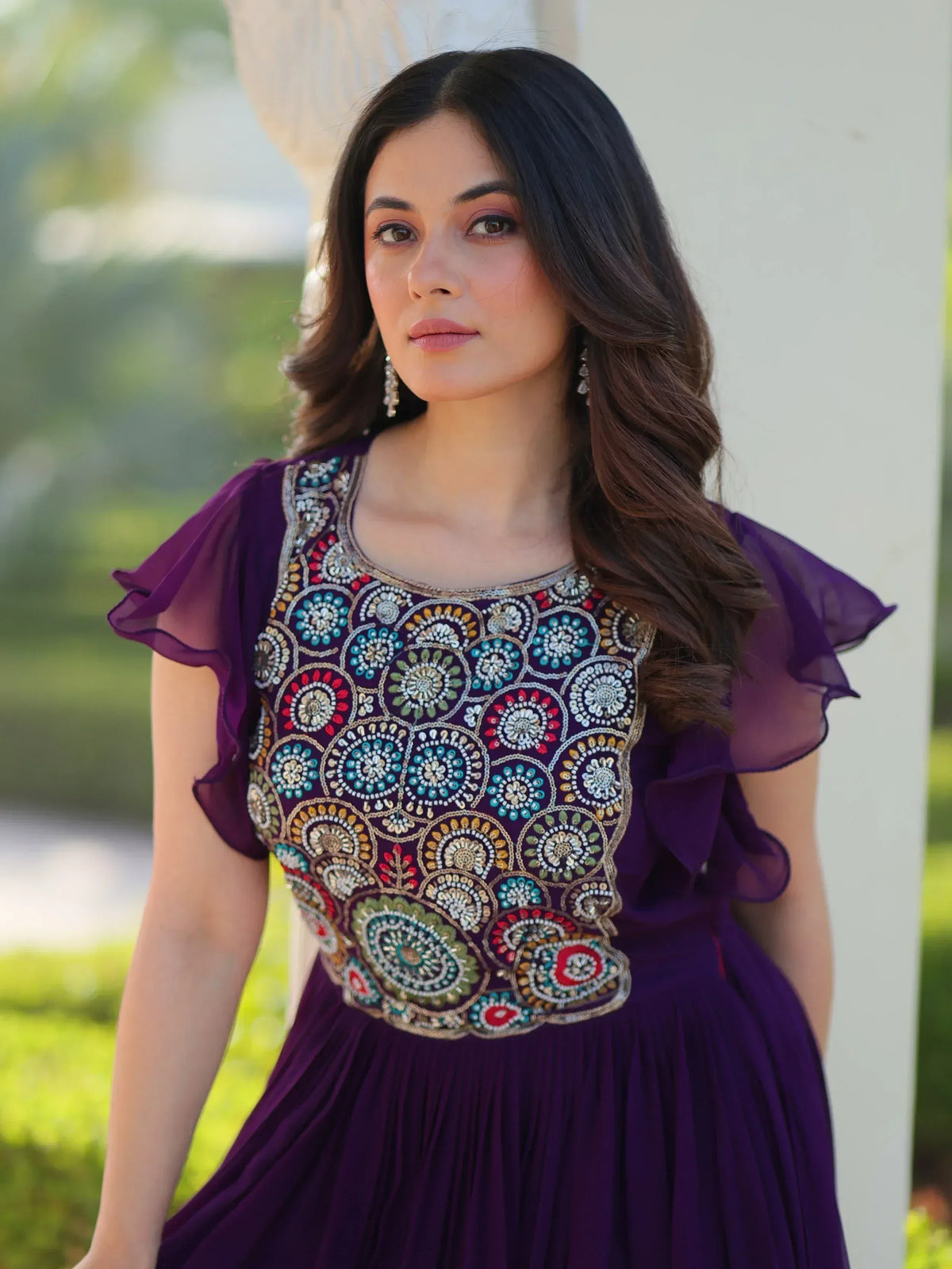 Purple ethnic gown with colorful floral embroidery and ruffled sleeves for women