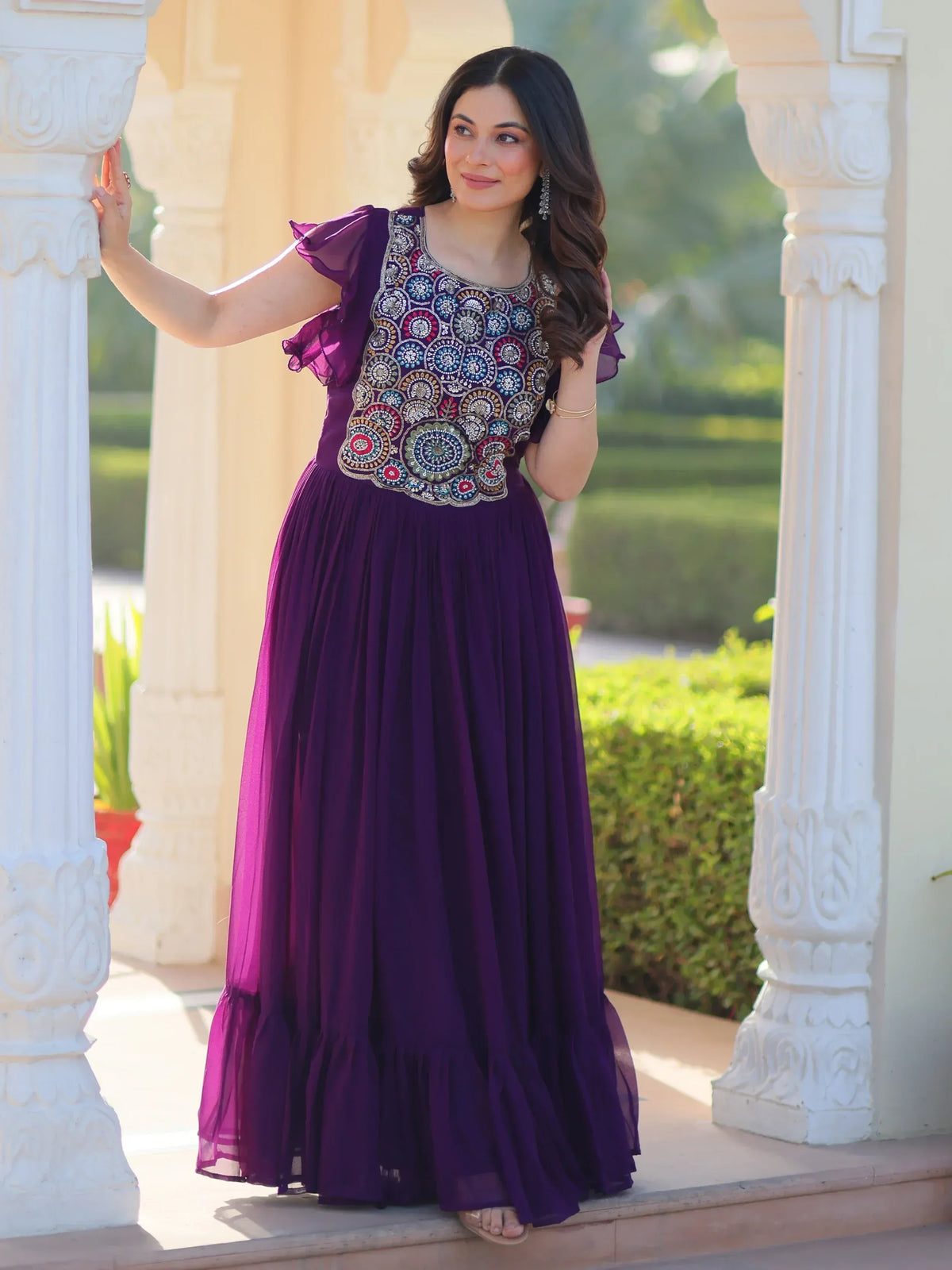 Purple ethnic gown with embroidered bodice and ruffle sleeves, perfect for Indian occasions