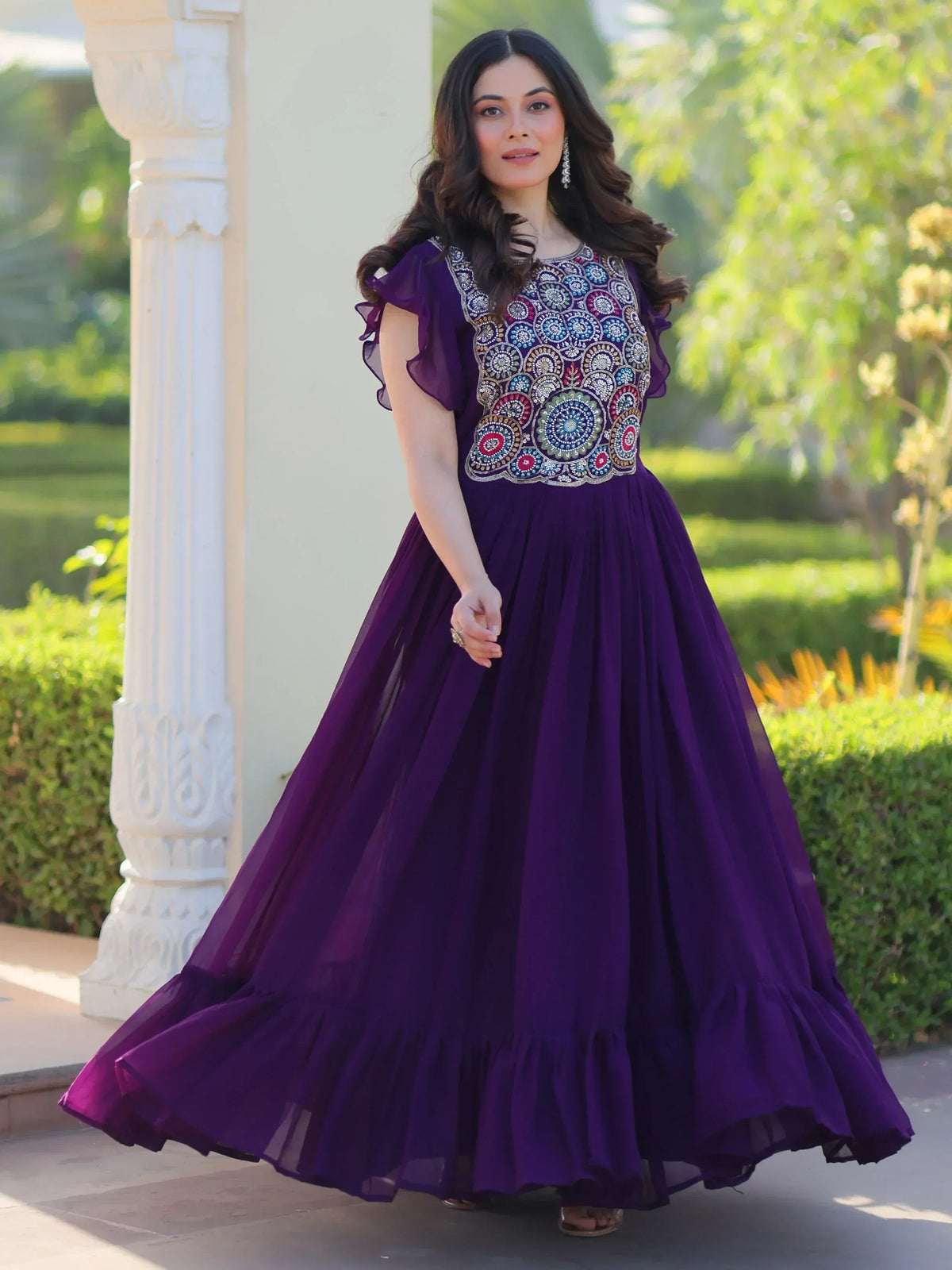 Purple ethnic gown with embroidered bodice and ruffled sleeves, perfect for Indian occasions