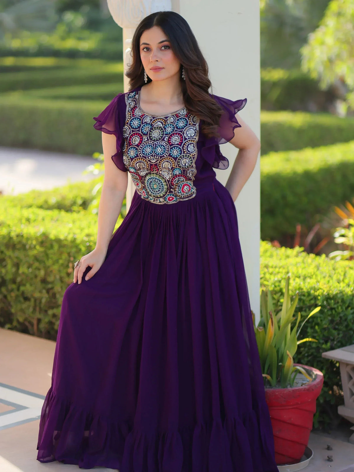 Purple ethnic gown with colorful embroidery, perfect for Indian festive occasions