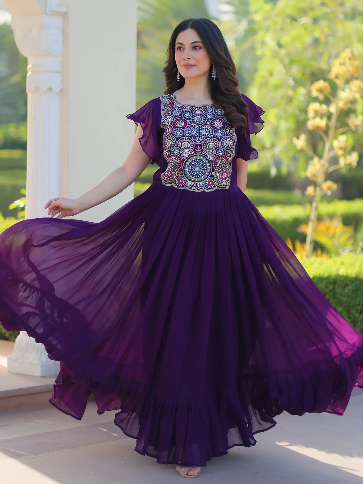 Purple ethnic gown with embroidered bodice and flared skirt, perfect for Indian occasions