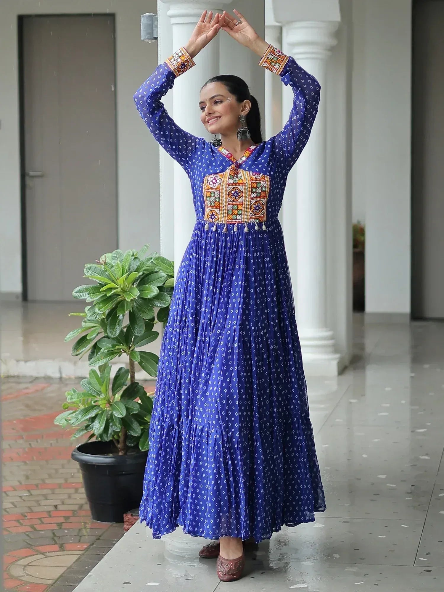 Blue ethnic gown with colorful embroidery, perfect for Indian festive wear and designer occasions