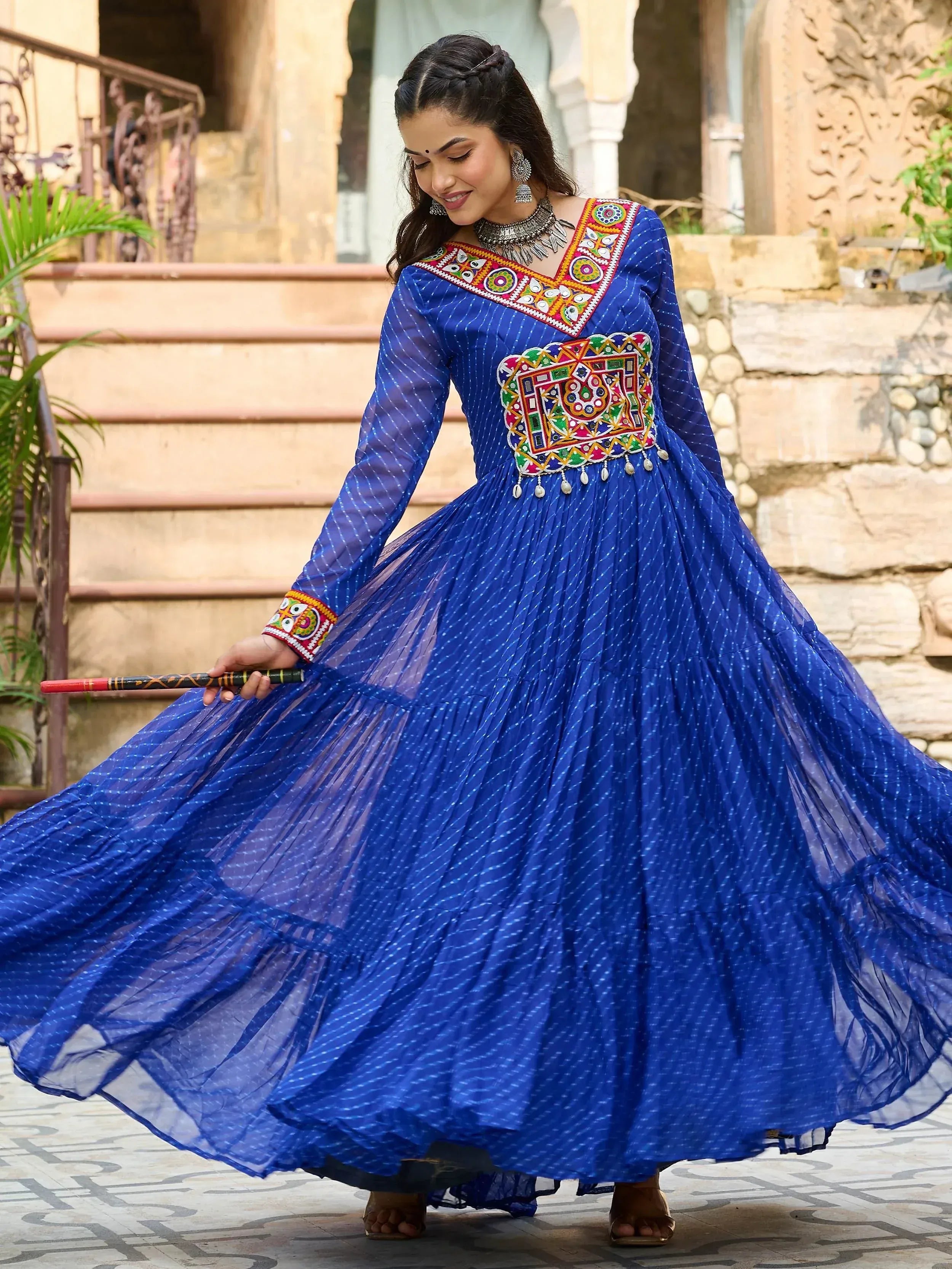 Blue ethnic gown with mirror work, perfect for Indian festivals and celebrations