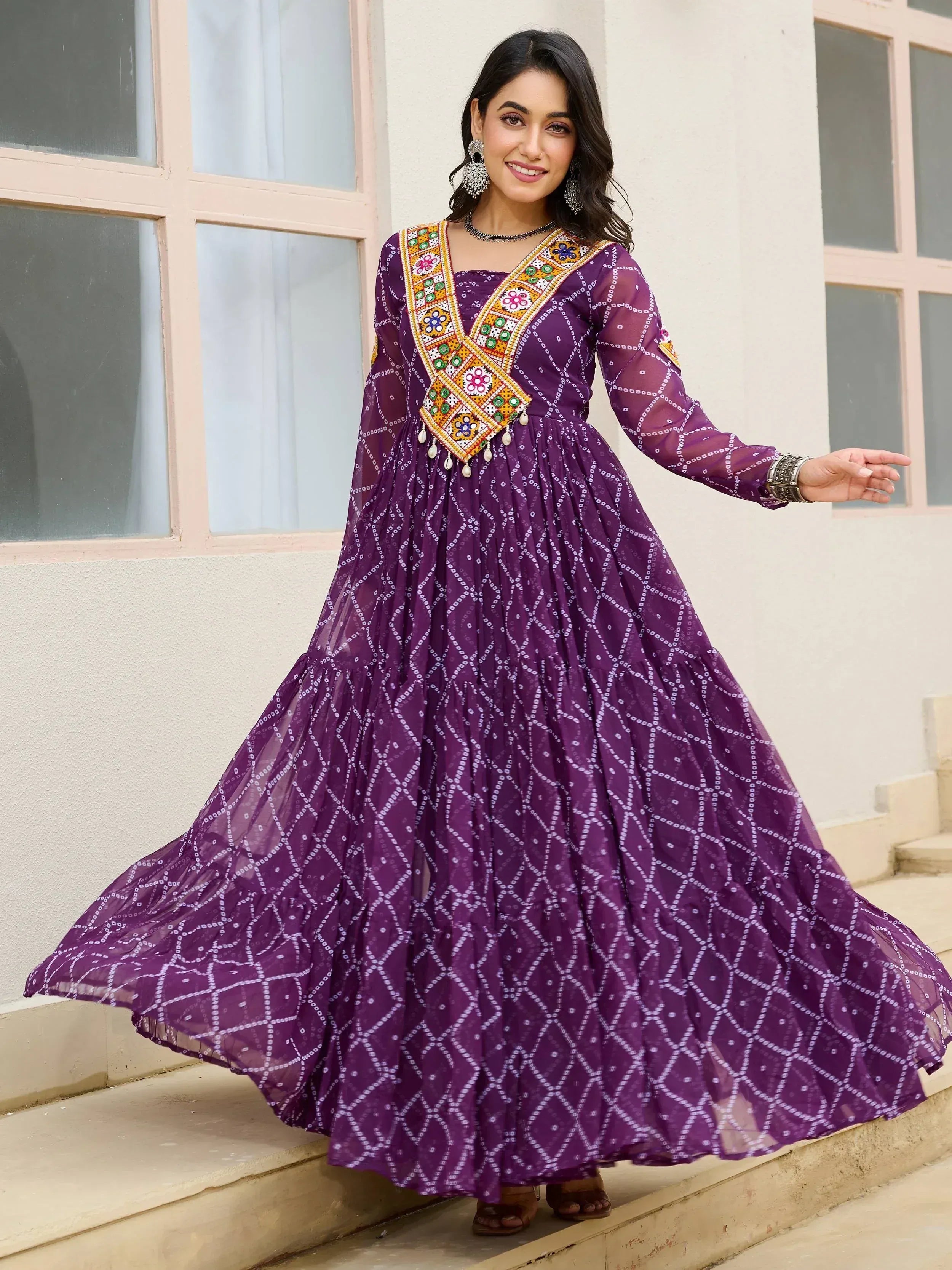 Purple ethnic gown with mirror work and geometric print, perfect for Indian festive wear