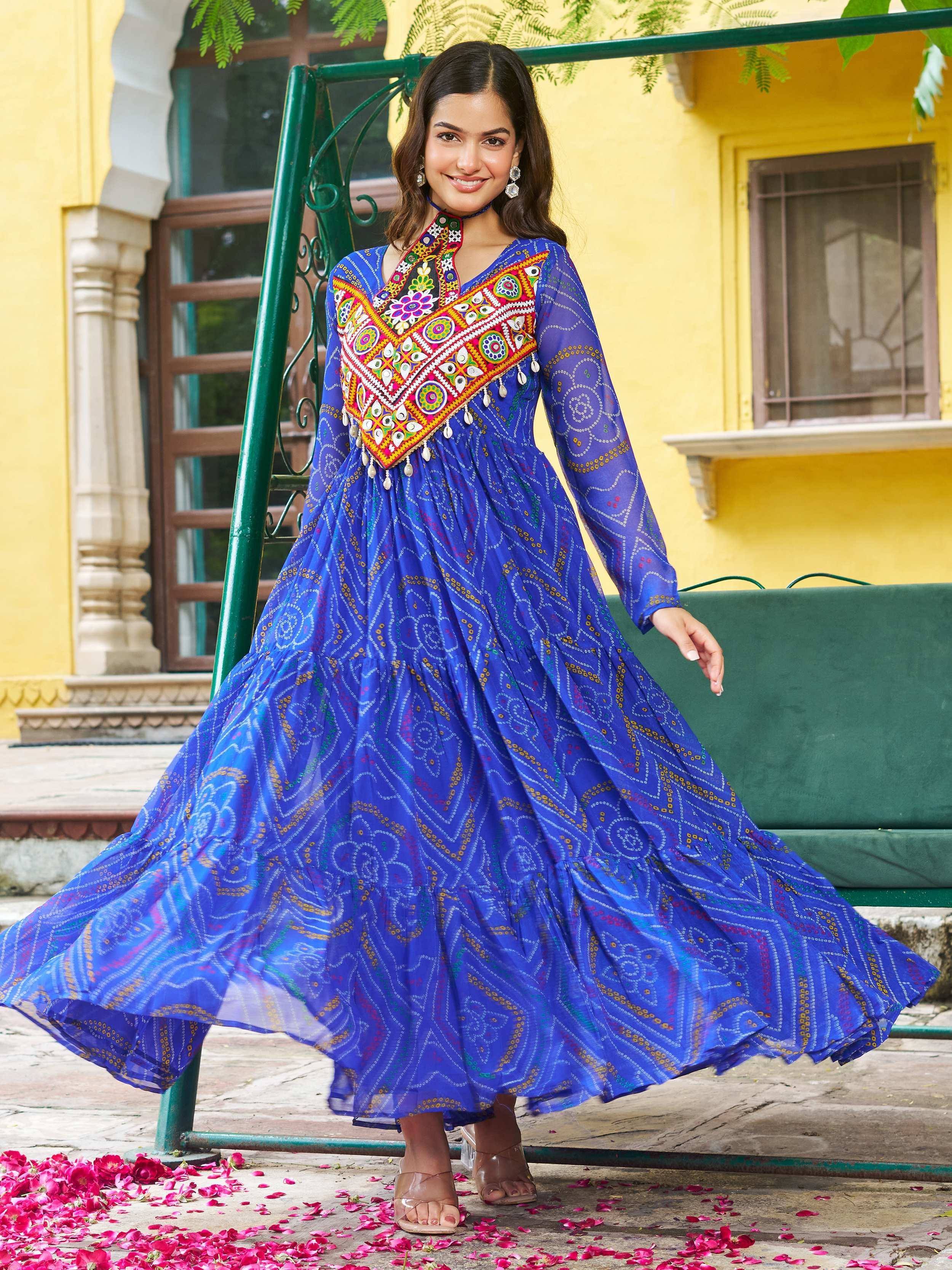 Blue embroidered ethnic gown with mirror work, perfect for Indian festive occasions and parties