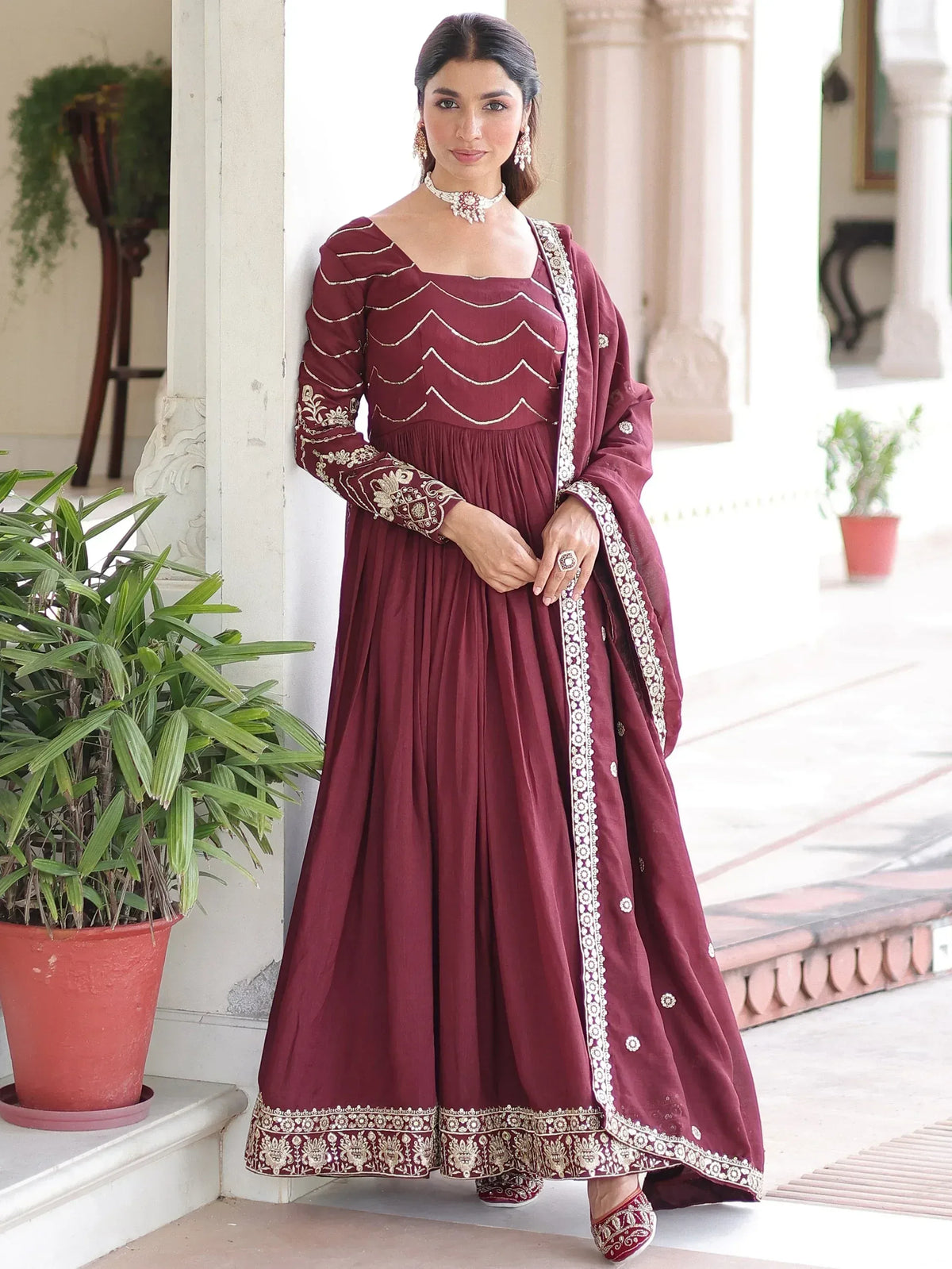 Maroon embroidered anarkali suit with gold detailing, perfect for Indian ethnic occasions