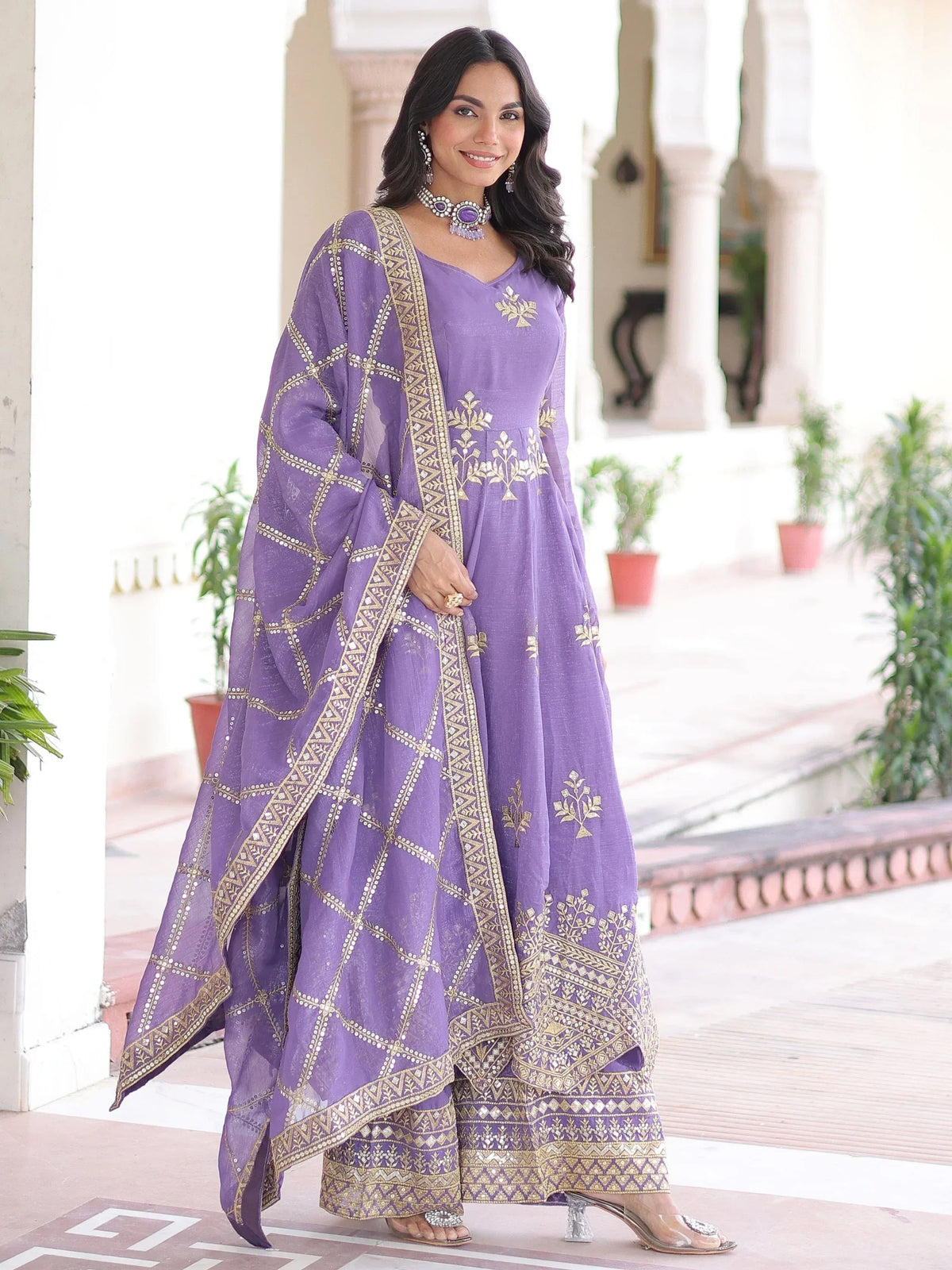Purple embroidered anarkali suit with gold detailing, perfect for Indian ethnic wear occasions