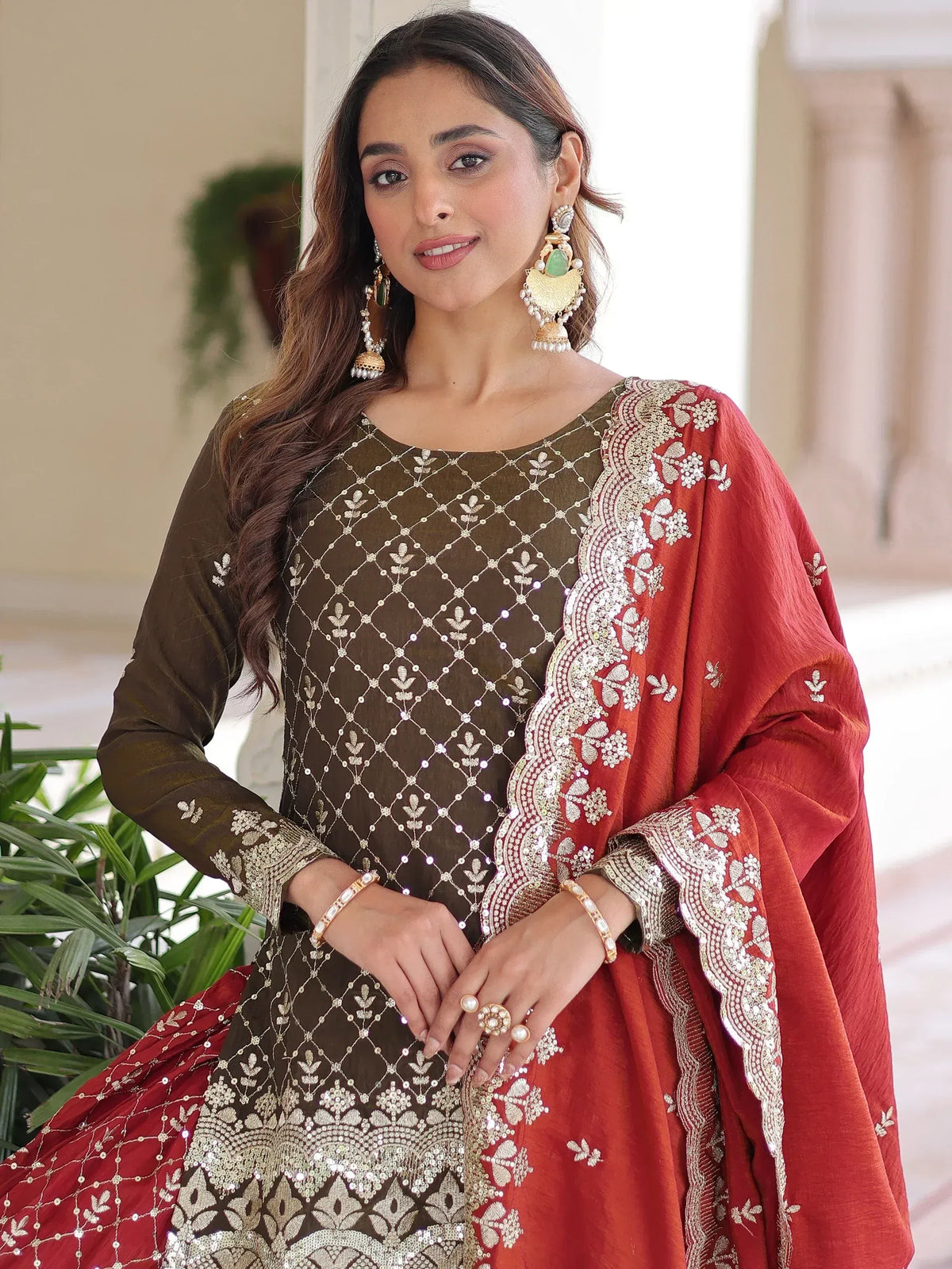 Elegant Indian ethnic wear with embroidered olive green kurta and red dupatta, perfect for festive occasions.