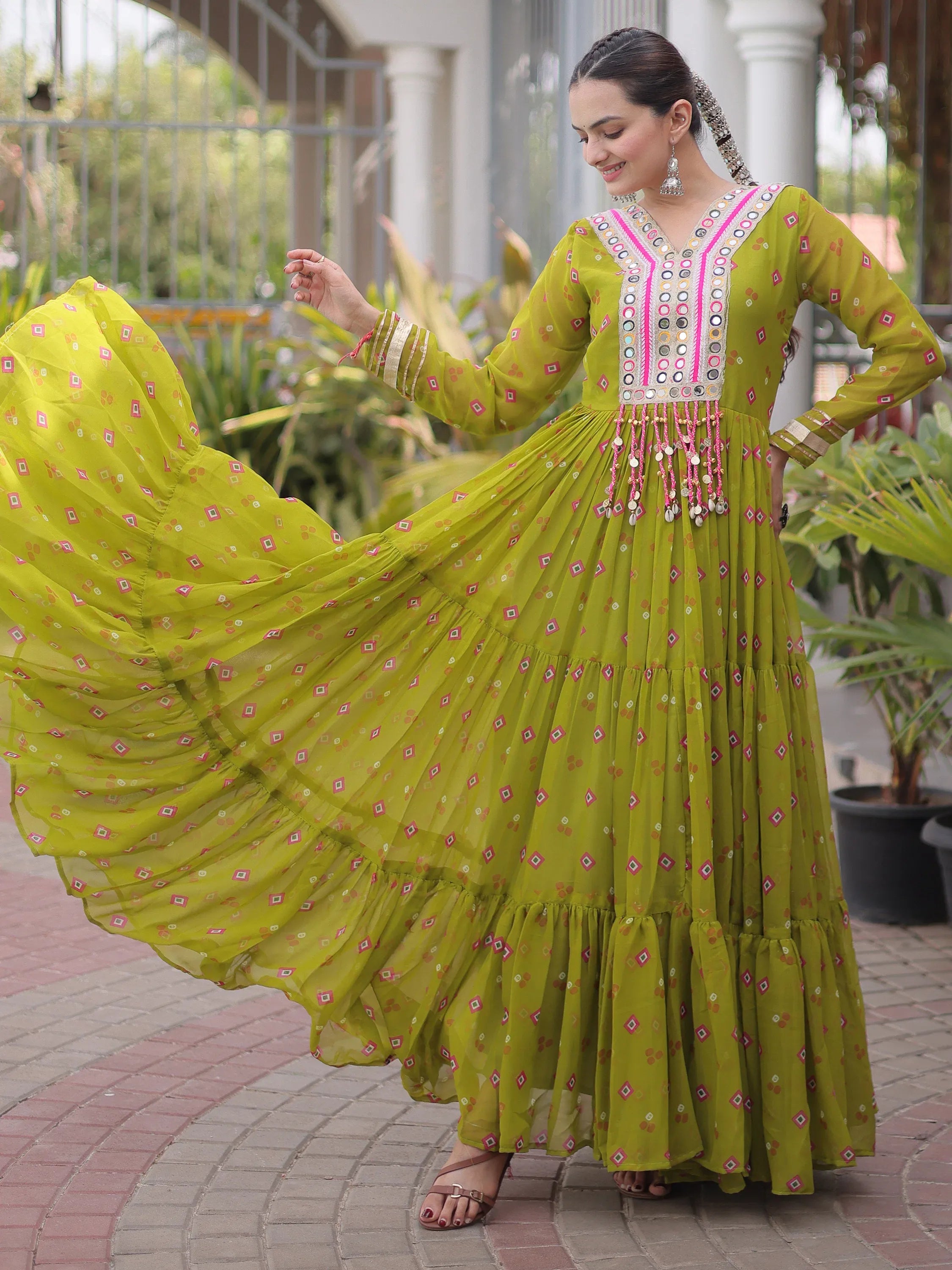 Notable Olive Green Laheriya Printed Georgette Navratri Wear Gown