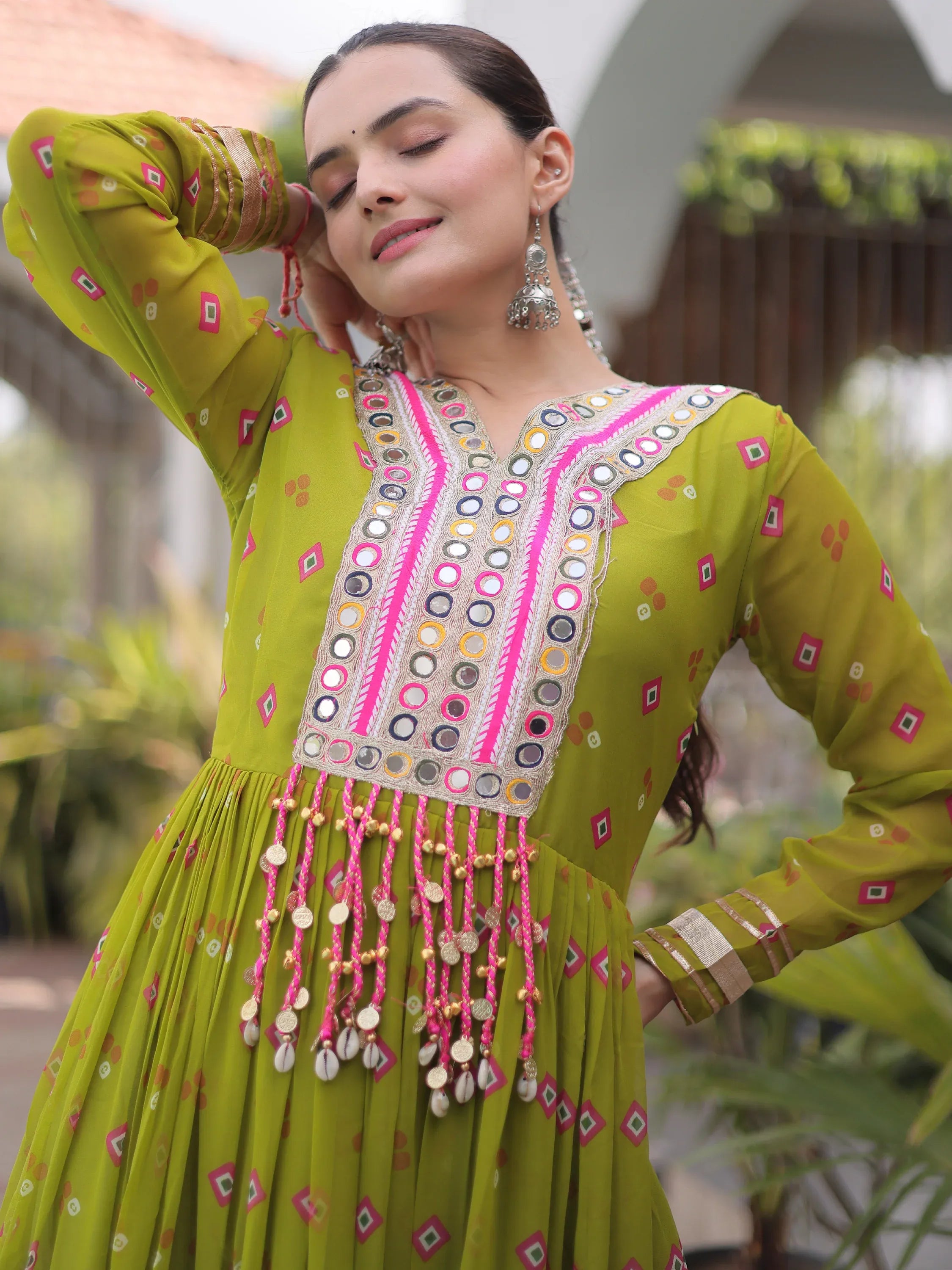 Notable Olive Green Laheriya Printed Georgette Navratri Wear Gown