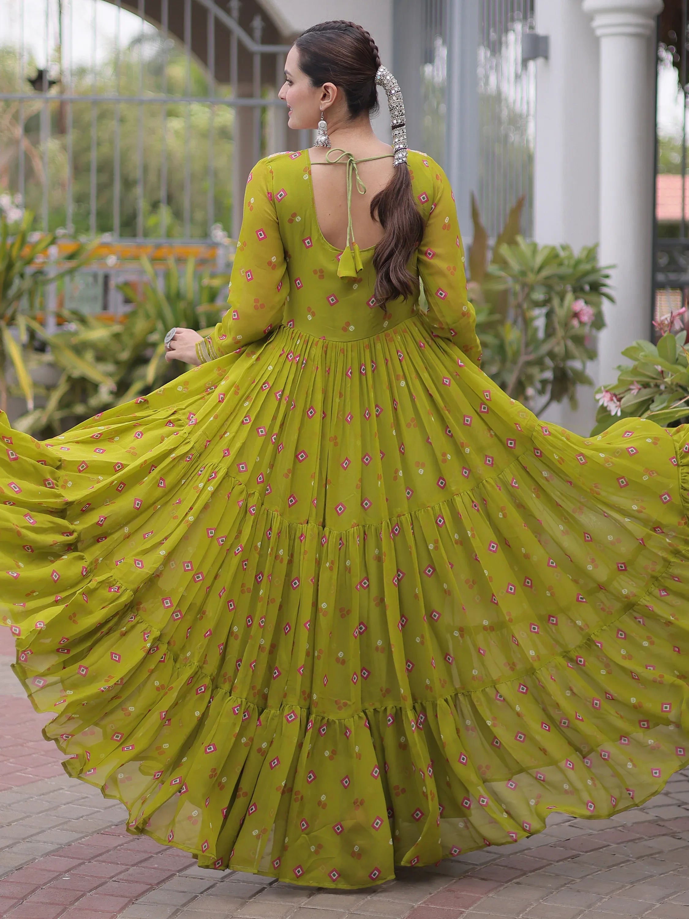 Notable Olive Green Laheriya Printed Georgette Navratri Wear Gown