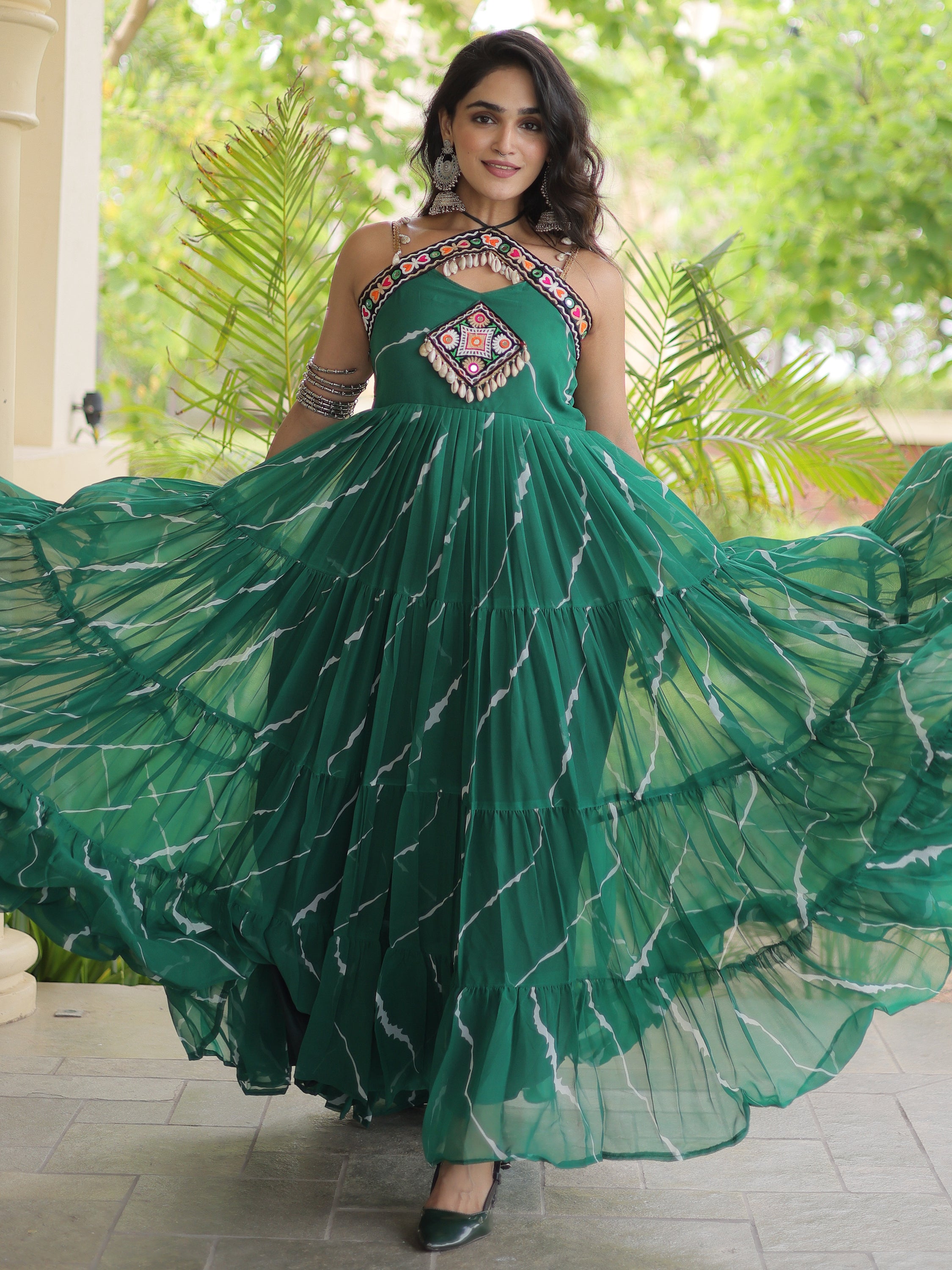 Striking Bottle Green Laheriya Printed Georgette Navratri Wear Gown