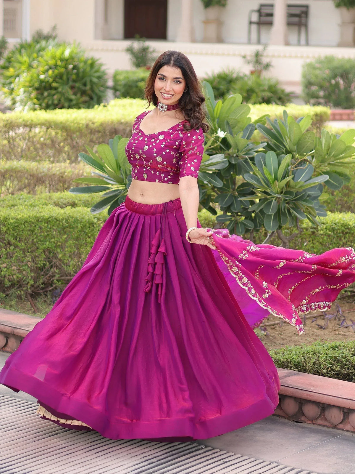 Purple embroidered lehenga choli with ruffled skirt, perfect for Indian ethnic wear events