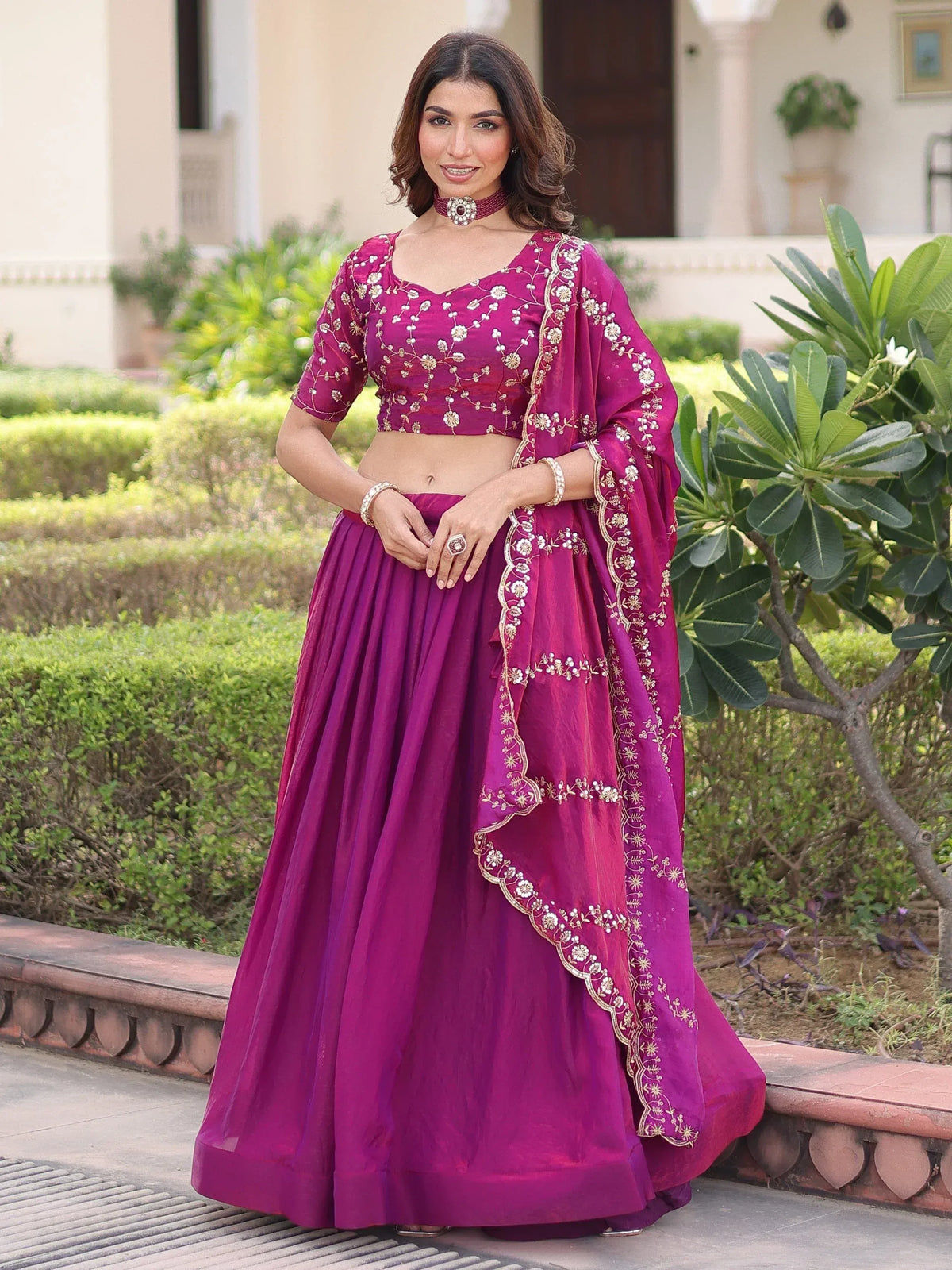 Purple embroidered lehenga choli with floral detailing, perfect for Indian ethnic wear occasions.