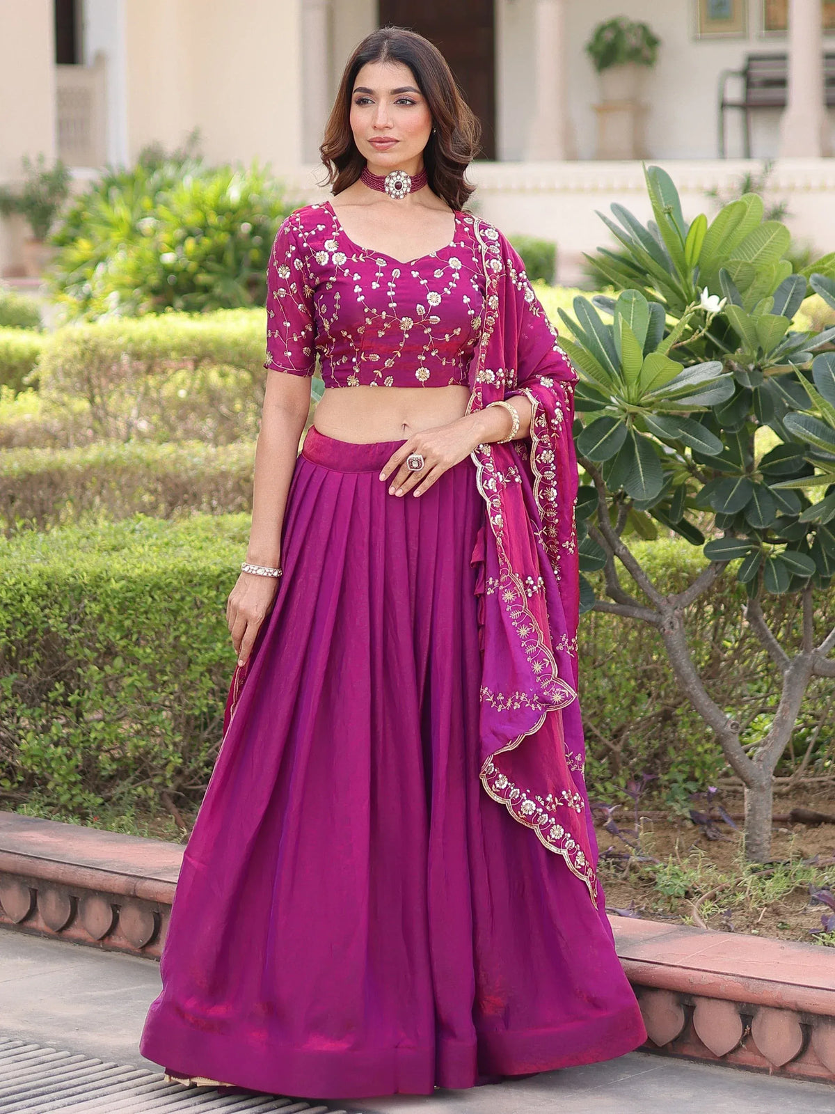 Purple embroidered lehenga choli with floral gold detailing, perfect for Indian ethnic wear and festive occasions.