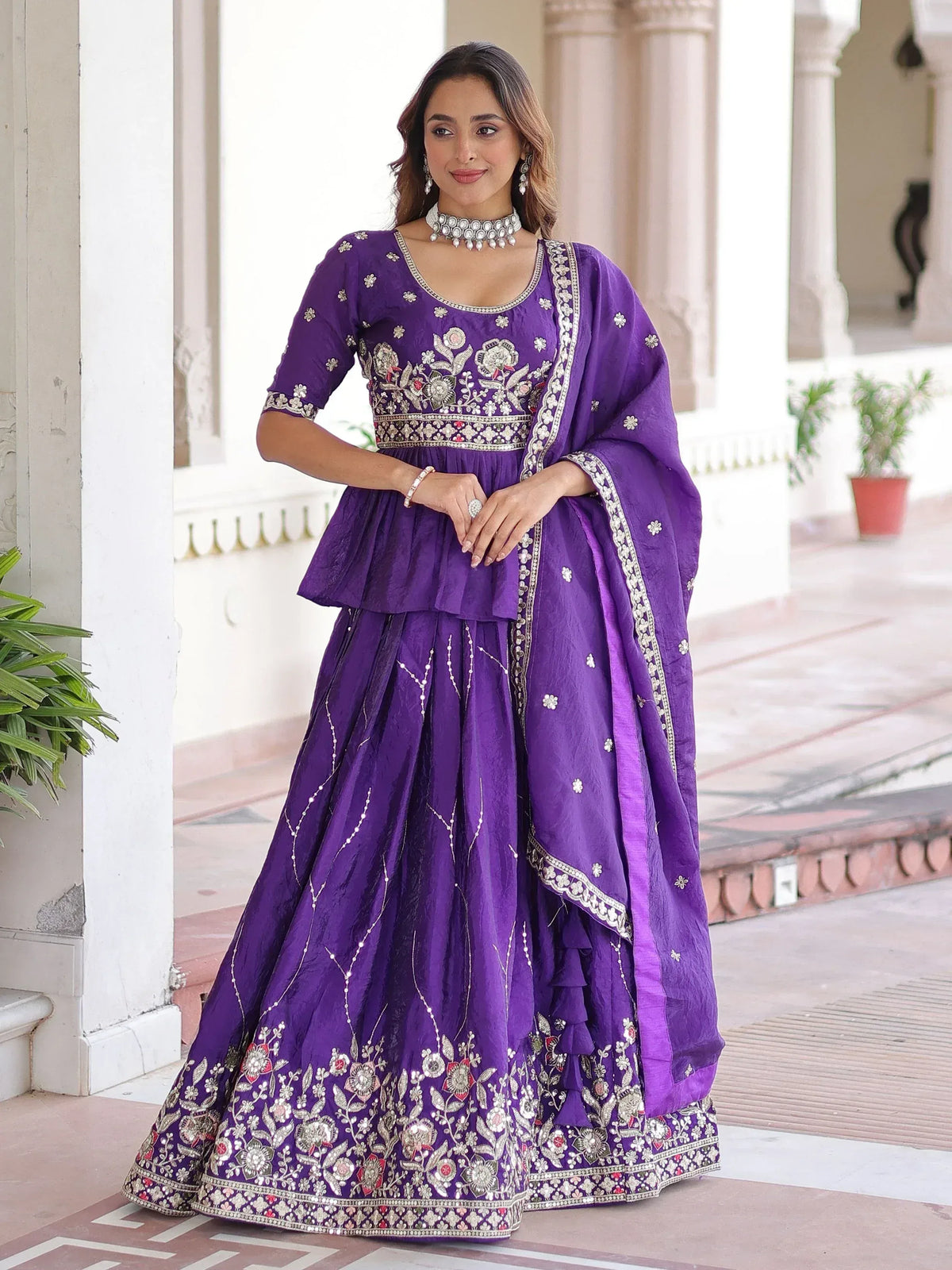 Purple embroidered lehenga choli with floral design, perfect for Indian ethnic wear and festive occasions