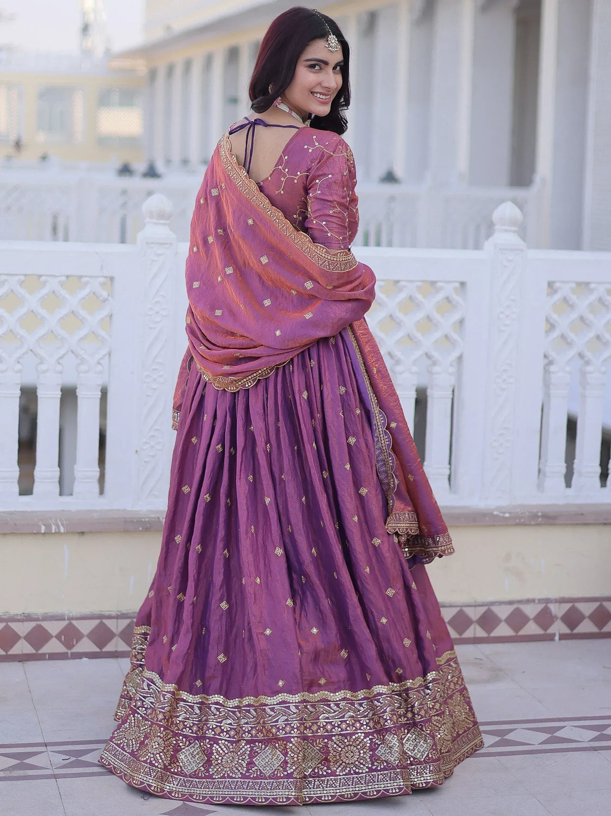 Purple designer lehenga choli with gold embroidery, perfect for Indian ethnic wear occasions