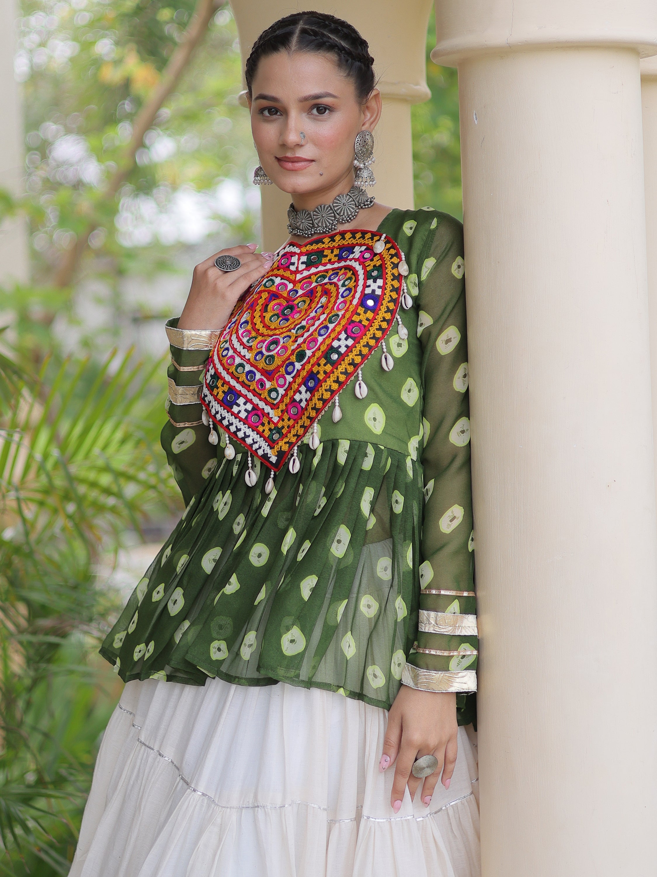 Attractive Green Cotton Navratri Lehenga With Patch Work Peplum Top