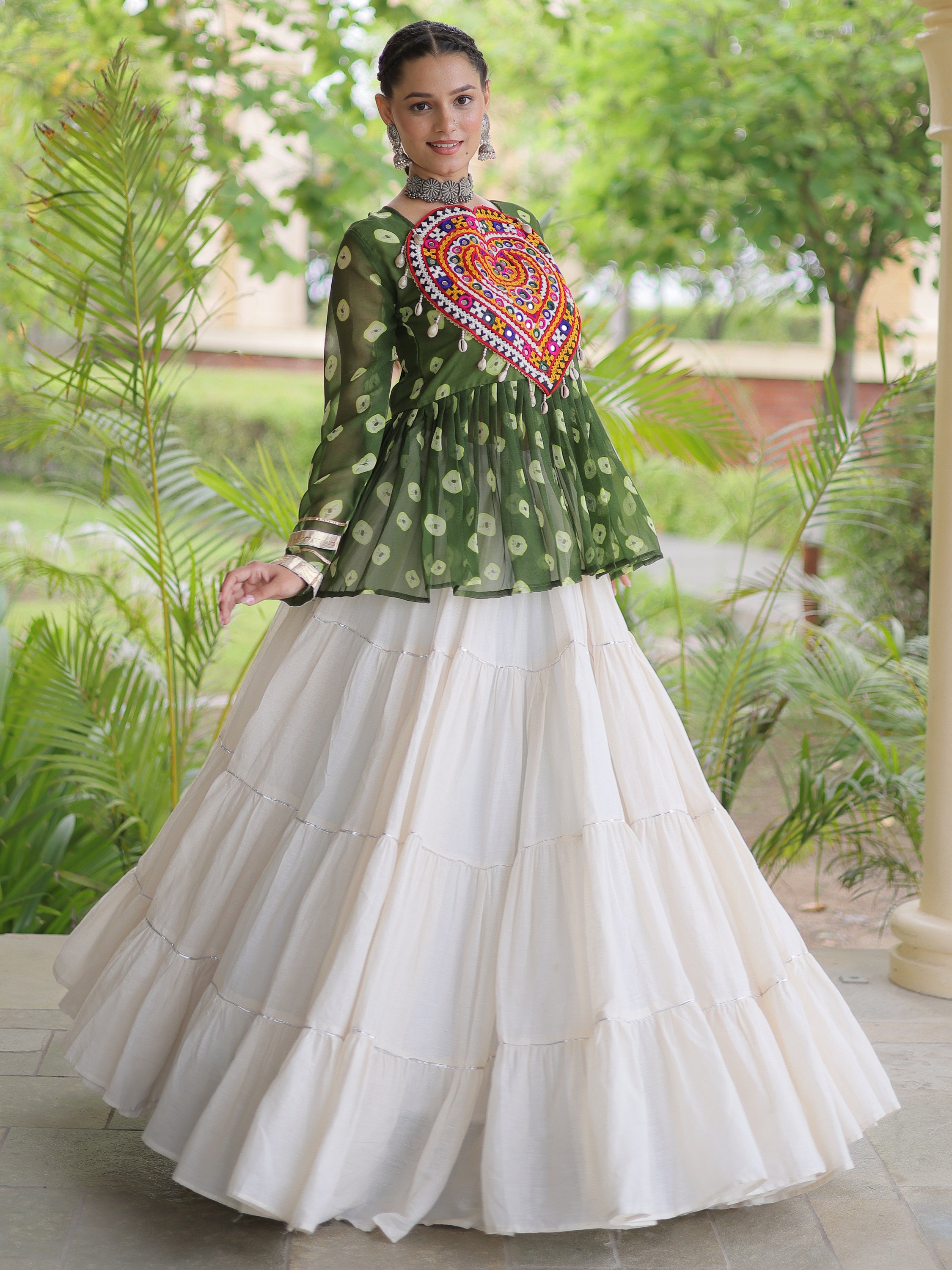 Attractive Green Cotton Navratri Lehenga With Patch Work Peplum Top