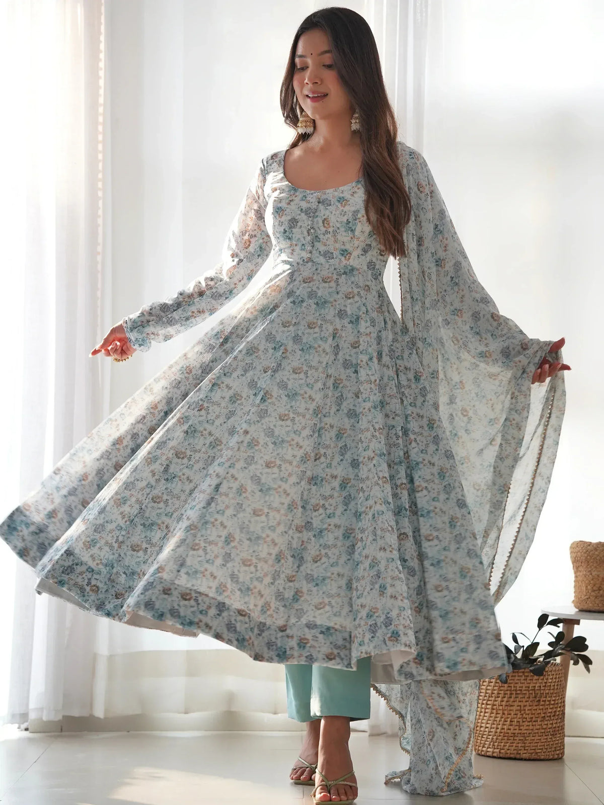 Floral print ethnic gown with flared sleeves and palazzo pants, perfect for Indian occasions