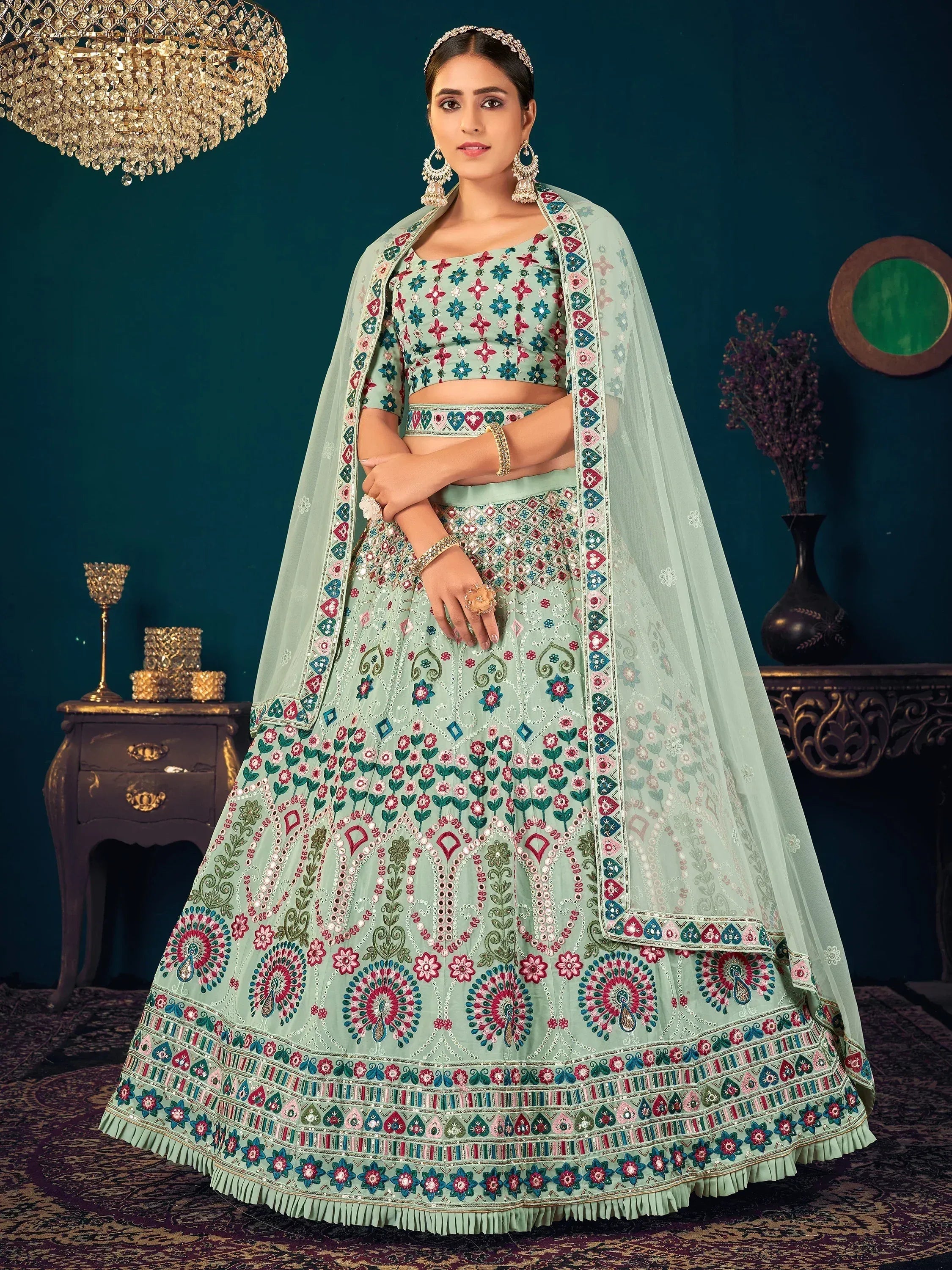 Elegant mint green lehenga choli with floral embroidery and matching dupatta for Indian ethnic wear